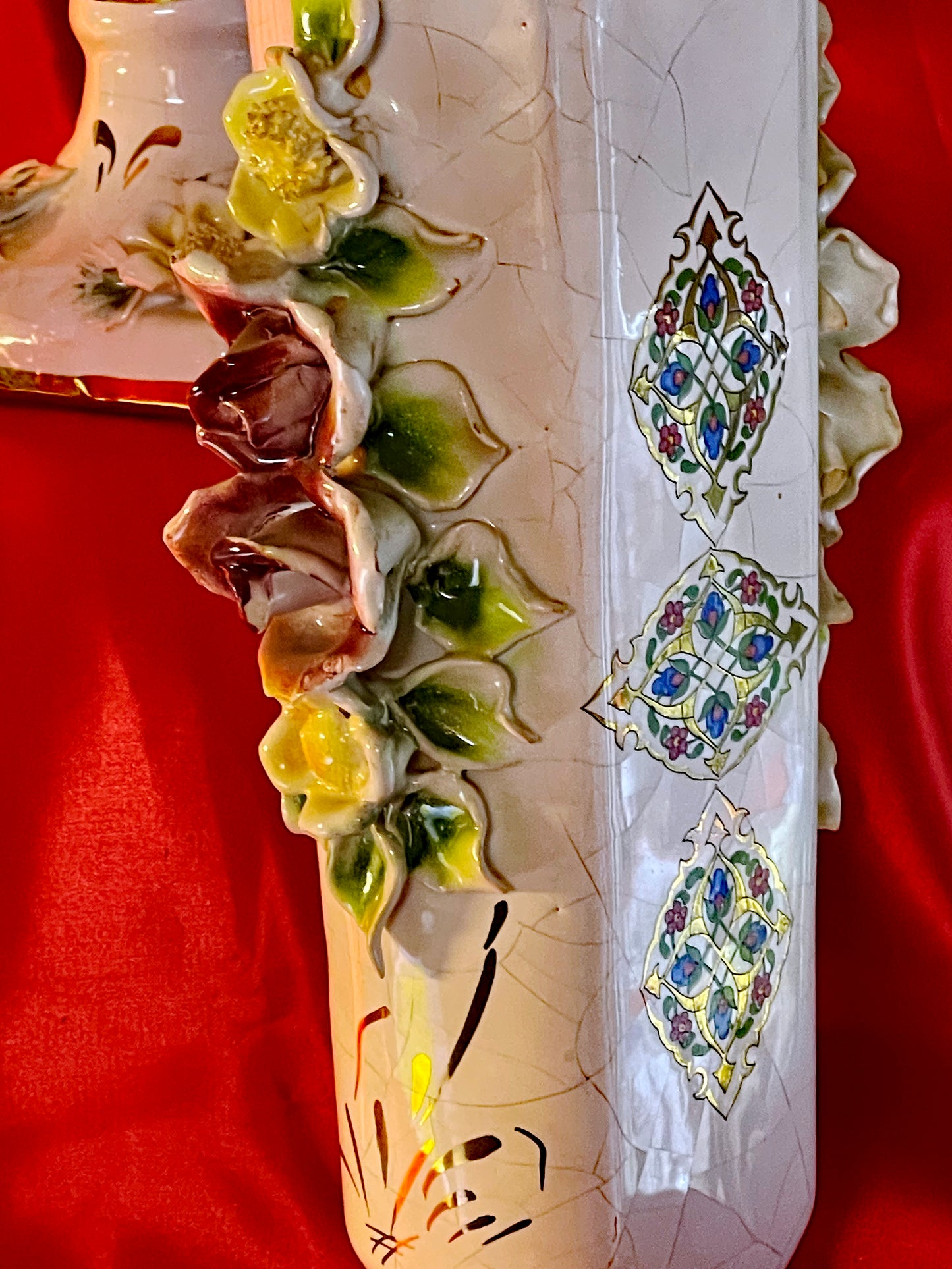 Detail of compote foot with applied roses and gilded accents