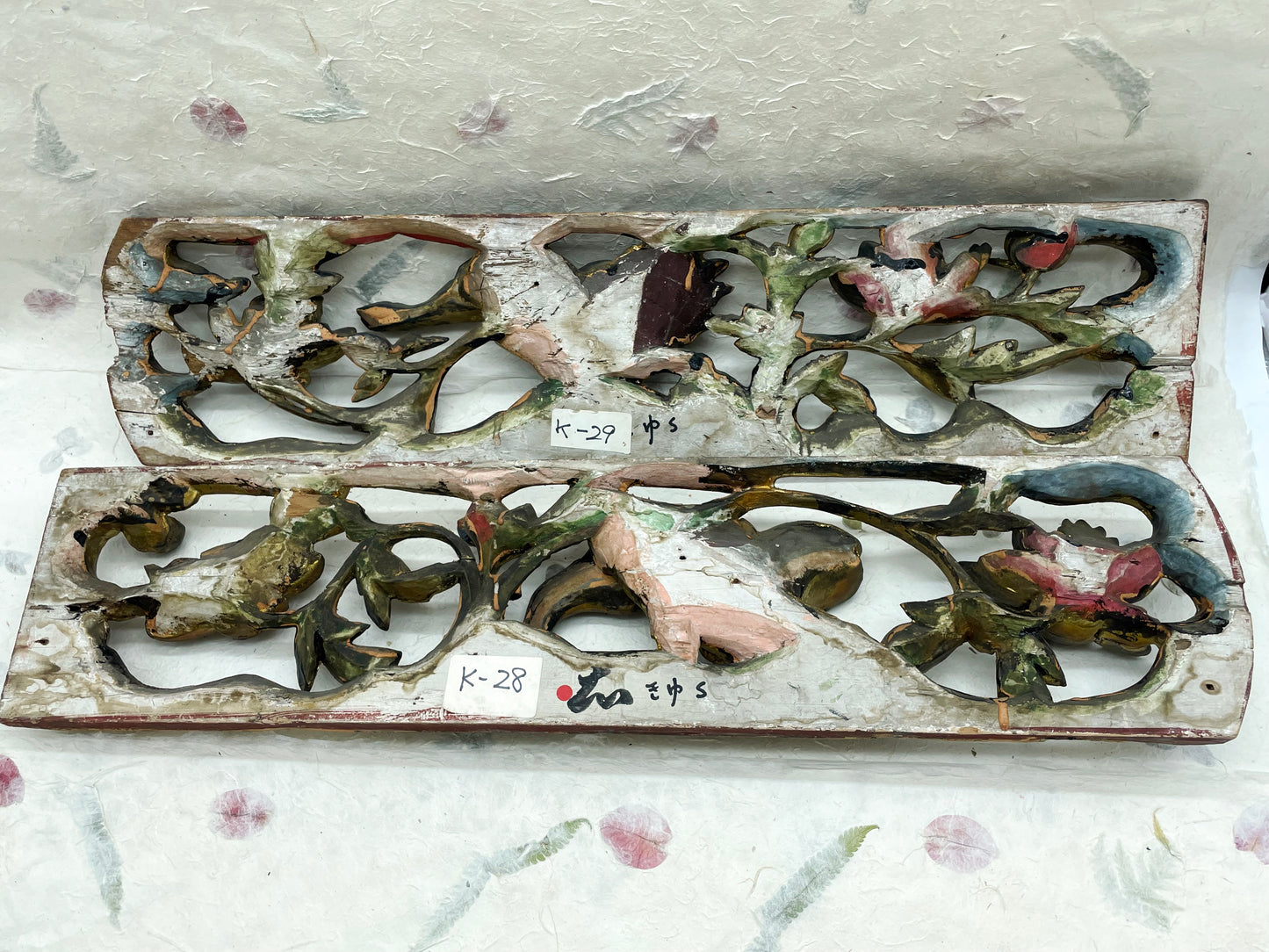 Antique Chinese giltwood panels displayed as a matched pair