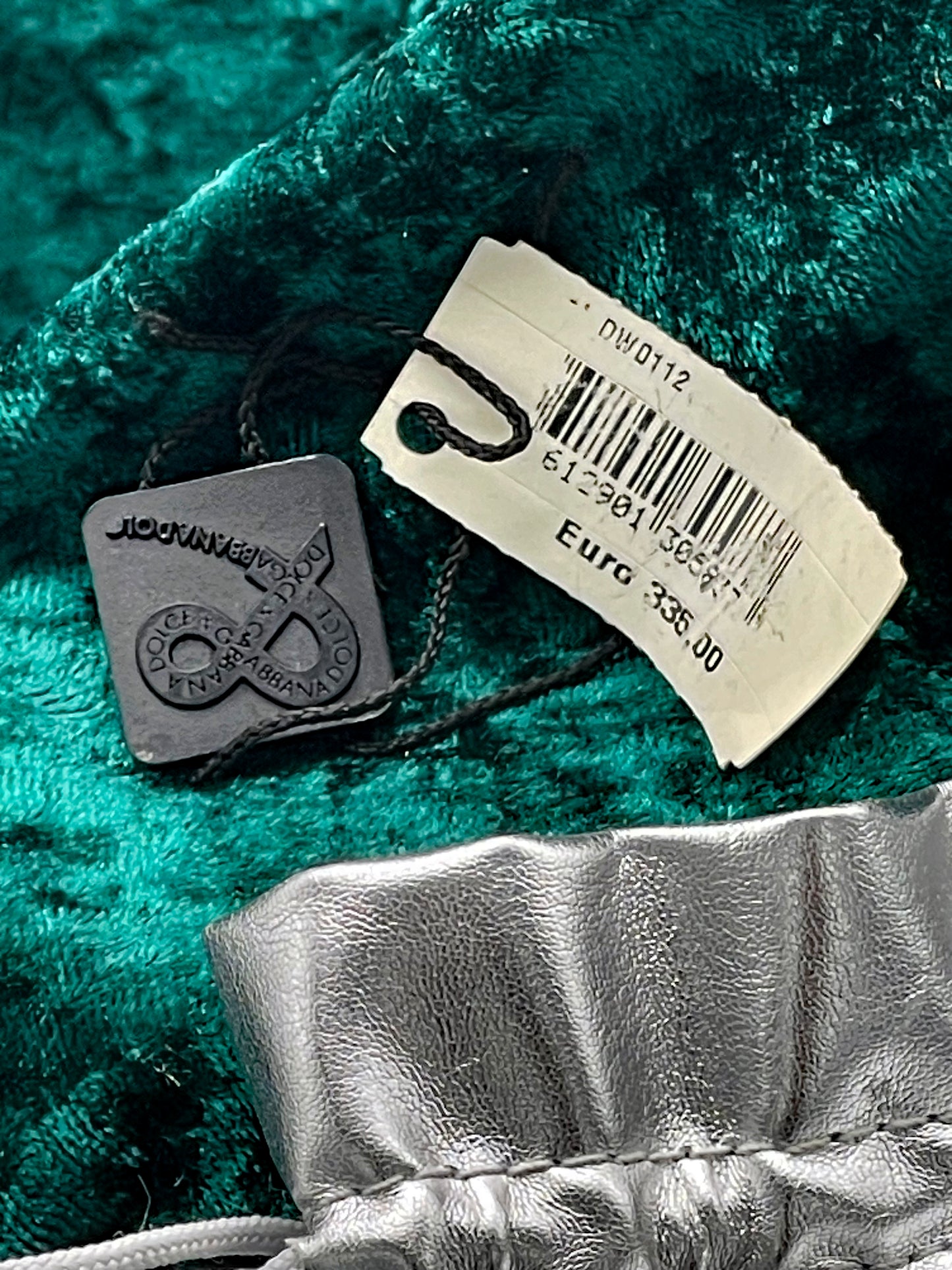 Original D&G hangtag showing model DW0112 and retail price