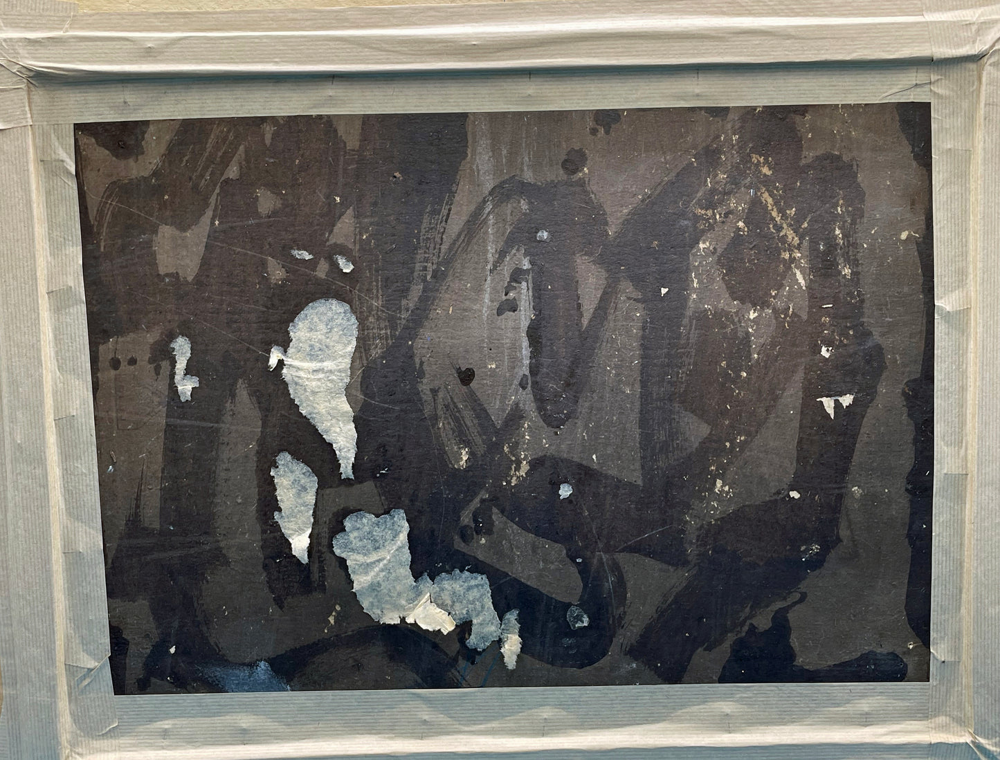 Reverse of the oil painting showing the original hard board support and age toning