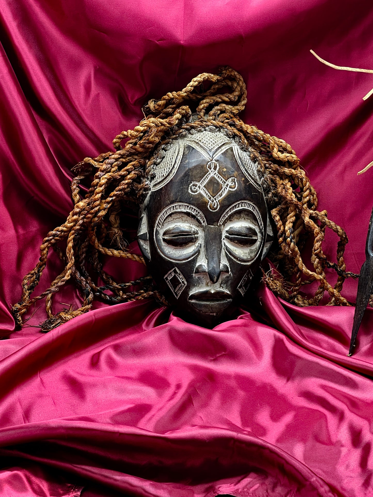 Mid-20th Century Chokwe Mask with Raffia Braids and Ceremonial Iron Arrow – Likely Congo