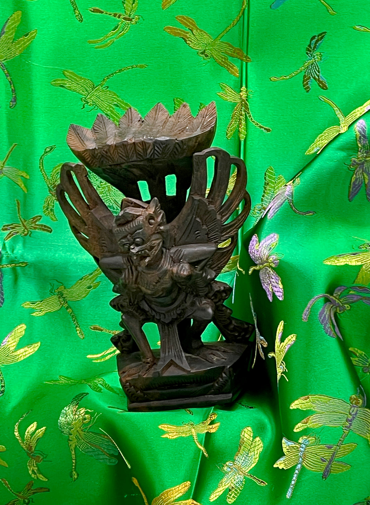 Full front view of the hand carved ebony flying Garuda statue from Bali