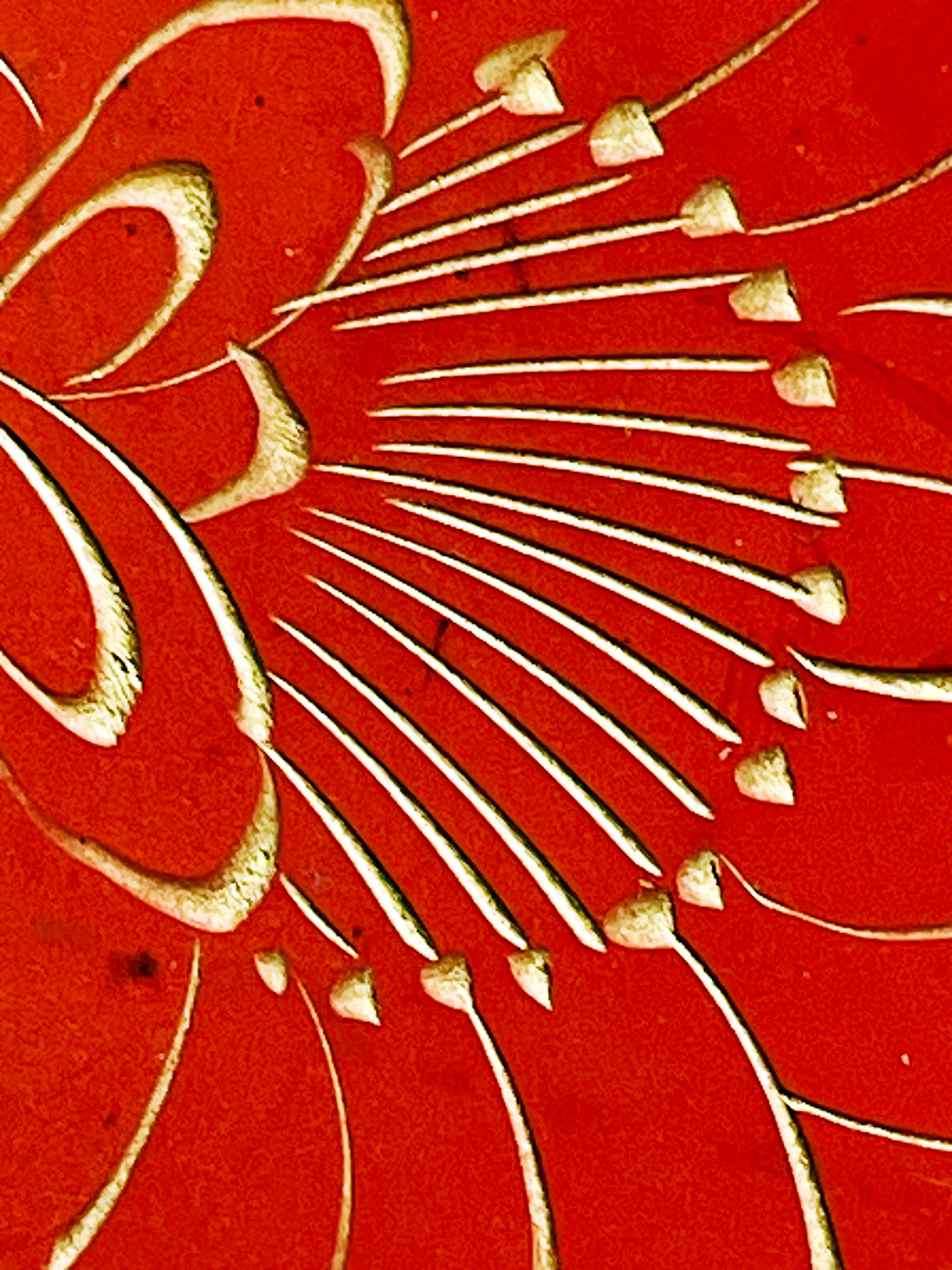 Macro of the millimetre-fine gold engraving lines and stamens