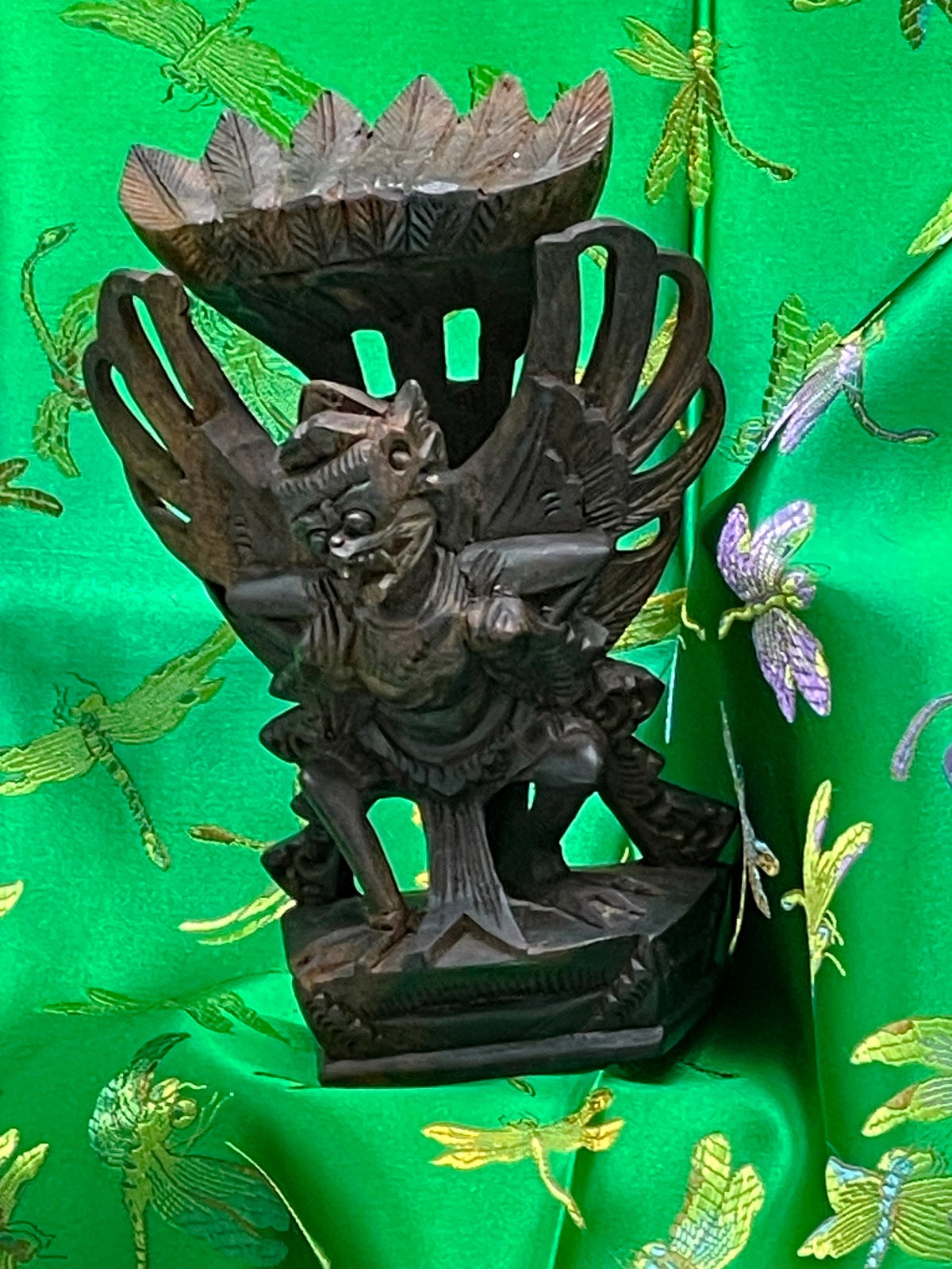 Side view of the hand carved Balinese ebony Garuda sculpture