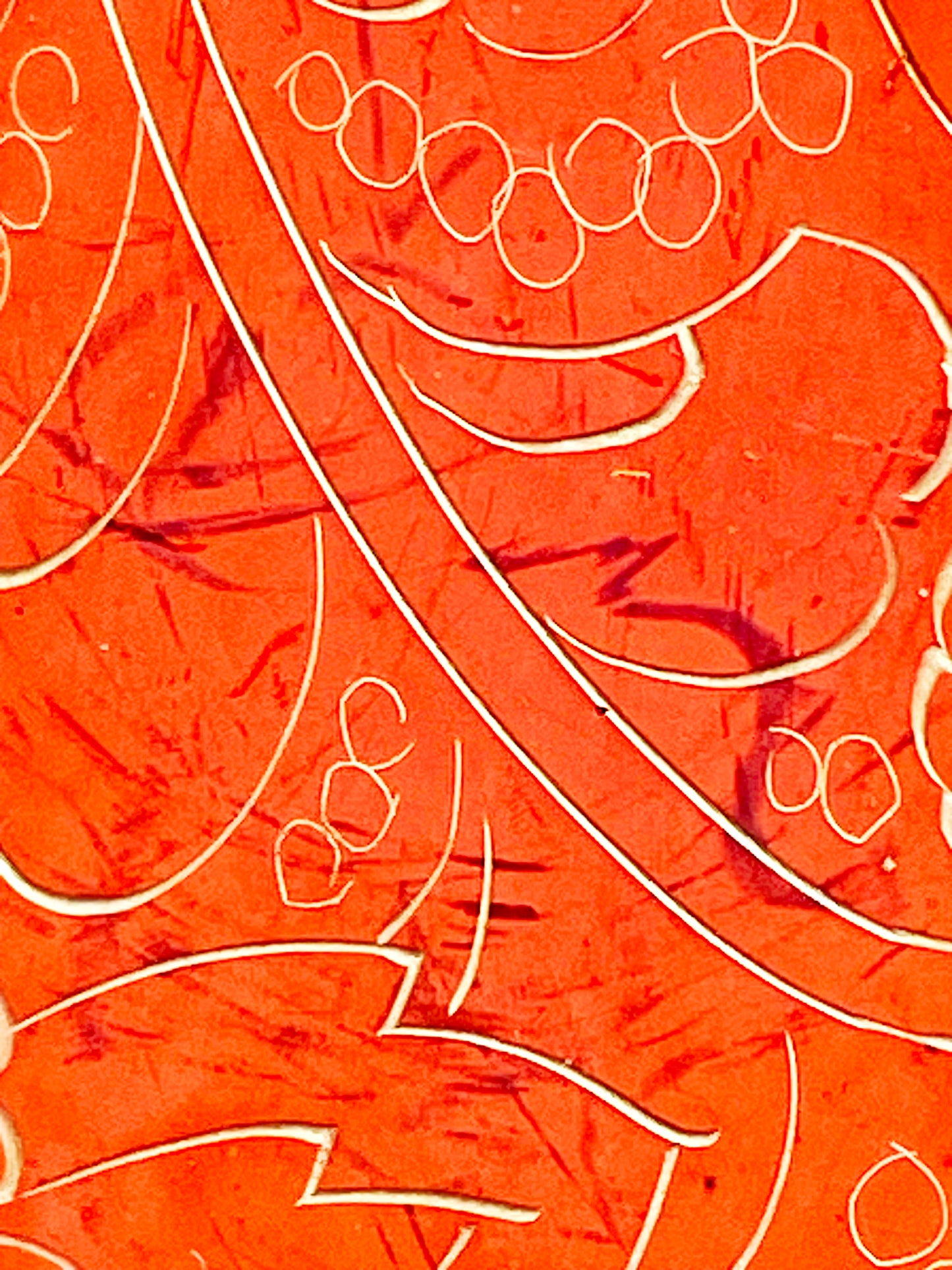 Detail of the engraved gold lines and fine krakelee crackle in the lacquer