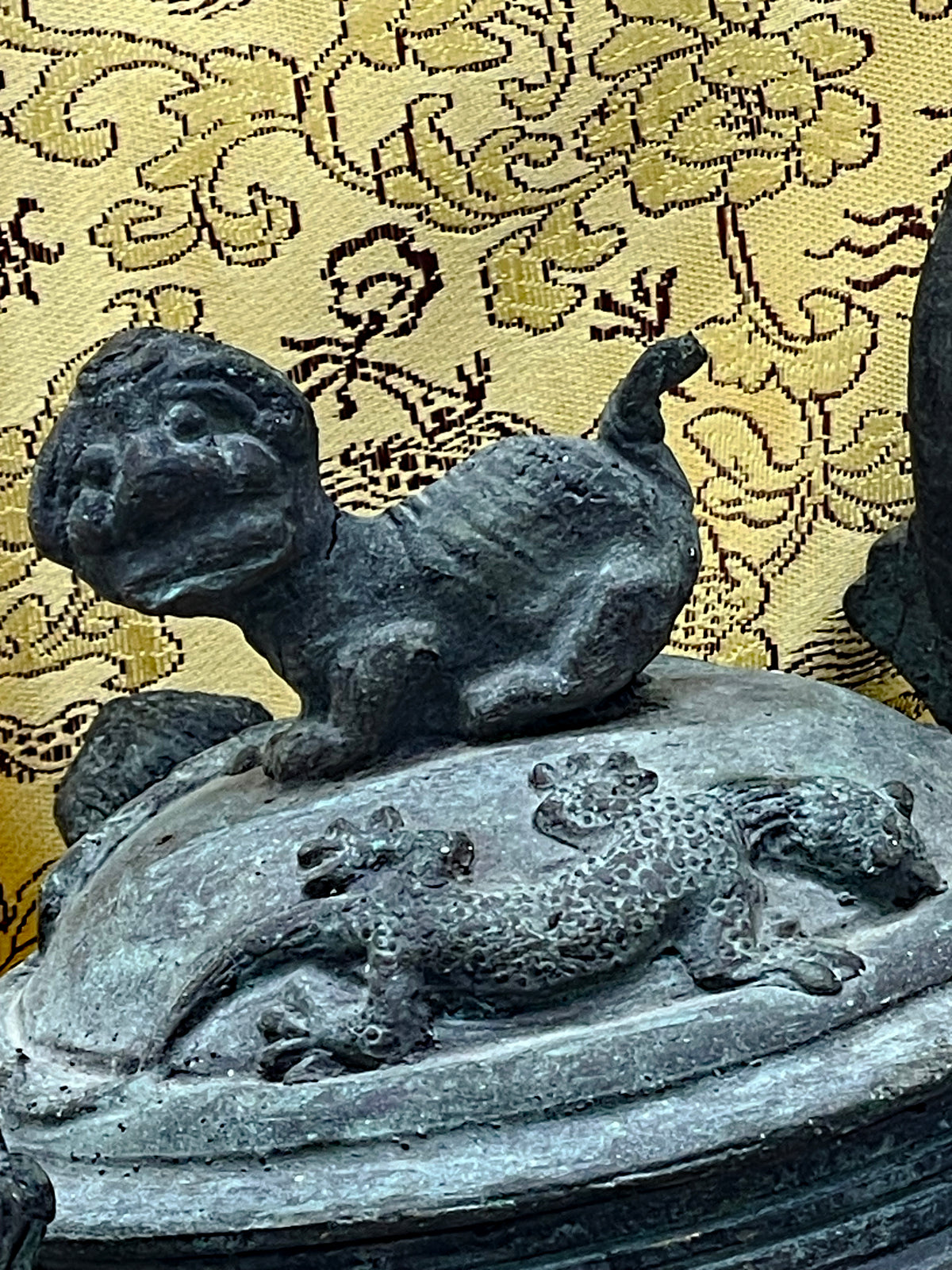 Detail of the arched branch form handle of the antique Chinese bronze teapot