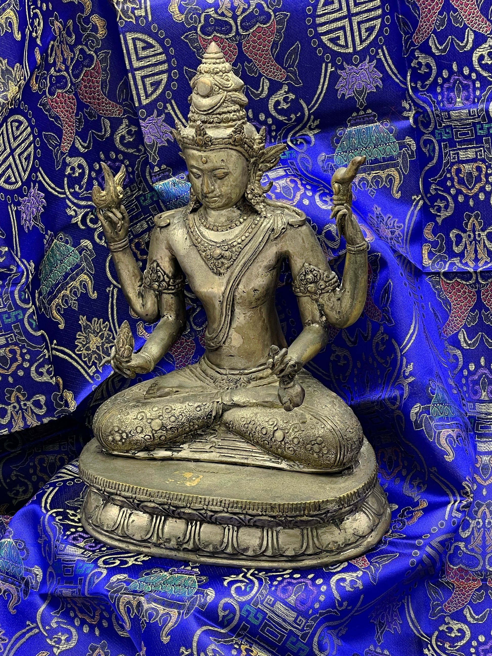 Java style bronze Vishnu figure, full front view showing four arms and ornate crown