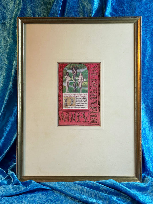 Illuminated manuscript miniature of Adam and Eve beneath the apple tree with vivid red border and gold lettering