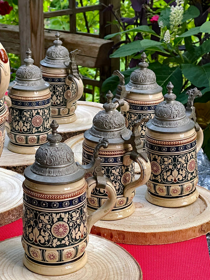 Early 1900s Reinhold Merkelbach German Salt-Glazed Beer Stein Set with Pewter Lids – 7-Piece Ensemble