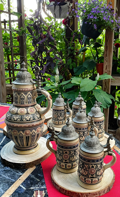 Early 1900s Reinhold Merkelbach German Salt-Glazed Beer Stein Set with Pewter Lids – 7-Piece Ensemble