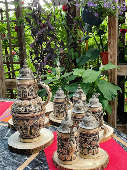 Early 1900s Reinhold Merkelbach German Salt-Glazed Beer Stein Set with Pewter Lids – 7-Piece Ensemble