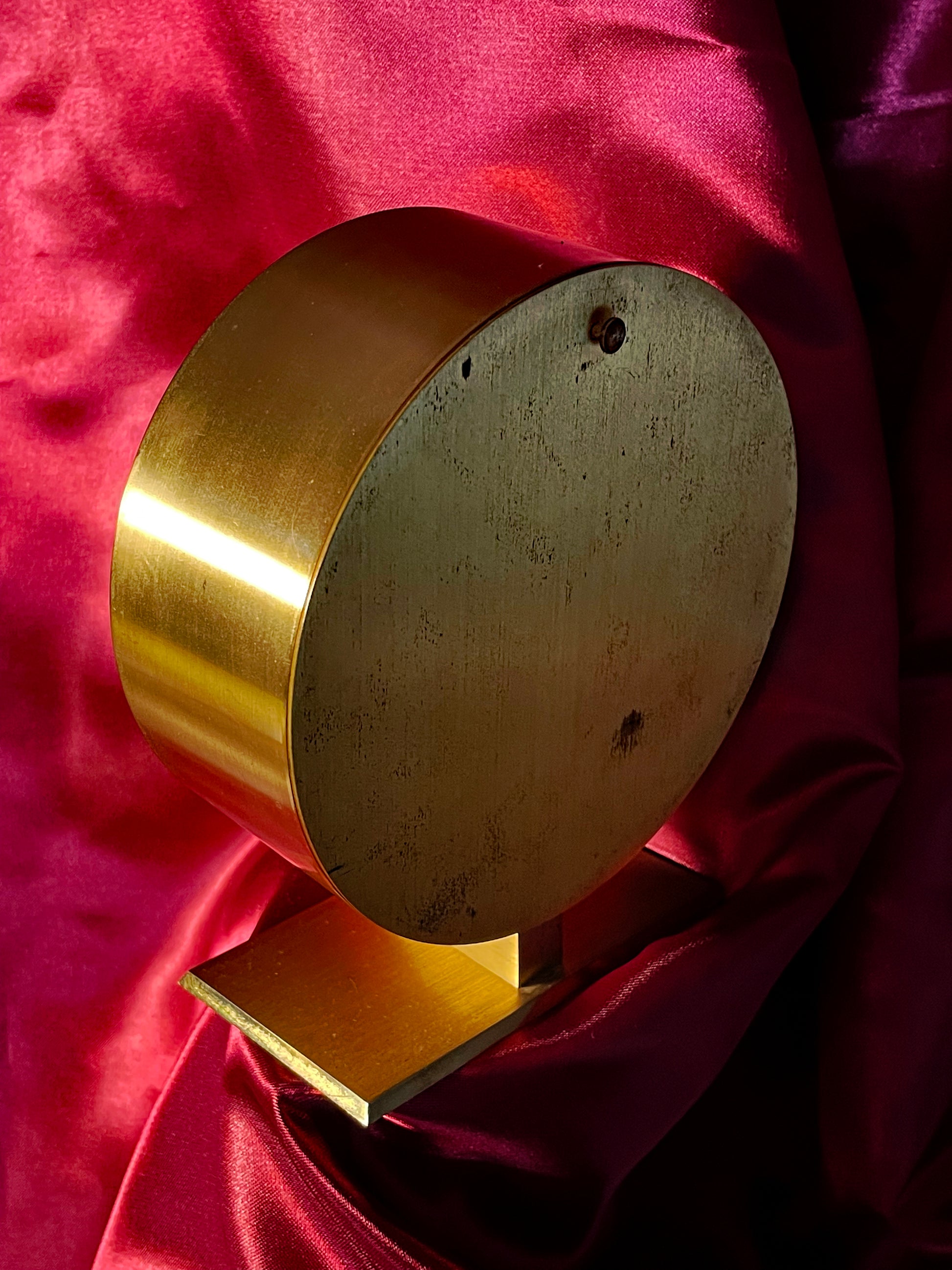 Reverse of the brass Schatz Elexacta drum clock showing back plate