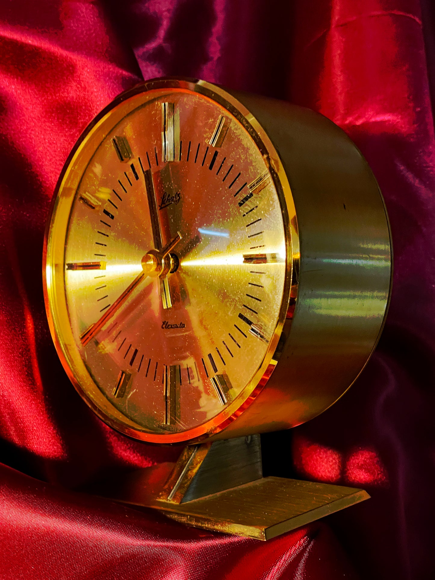 Brass Schatz table clock three-quarter right view showing drum case depth