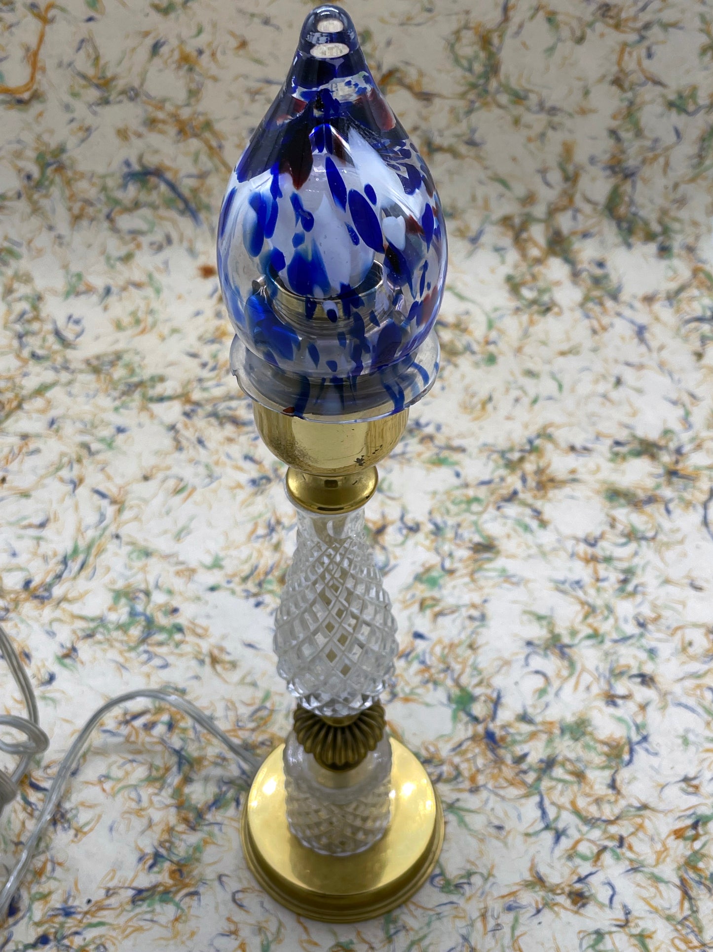 Single crystal table lamp with blue Murano glass flame shade, full view
