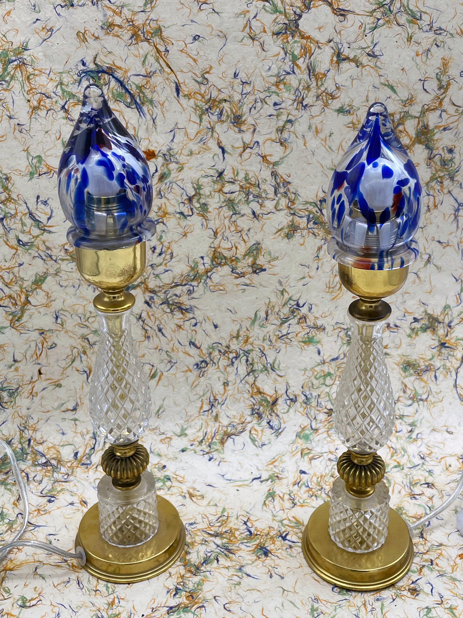 Two vintage crystal Murano glass table lamps standing side by side
