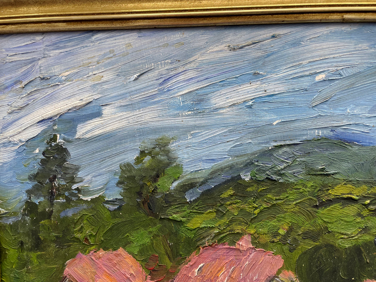 Close-up of the thick impasto sky and brushwork texture in the oil painting