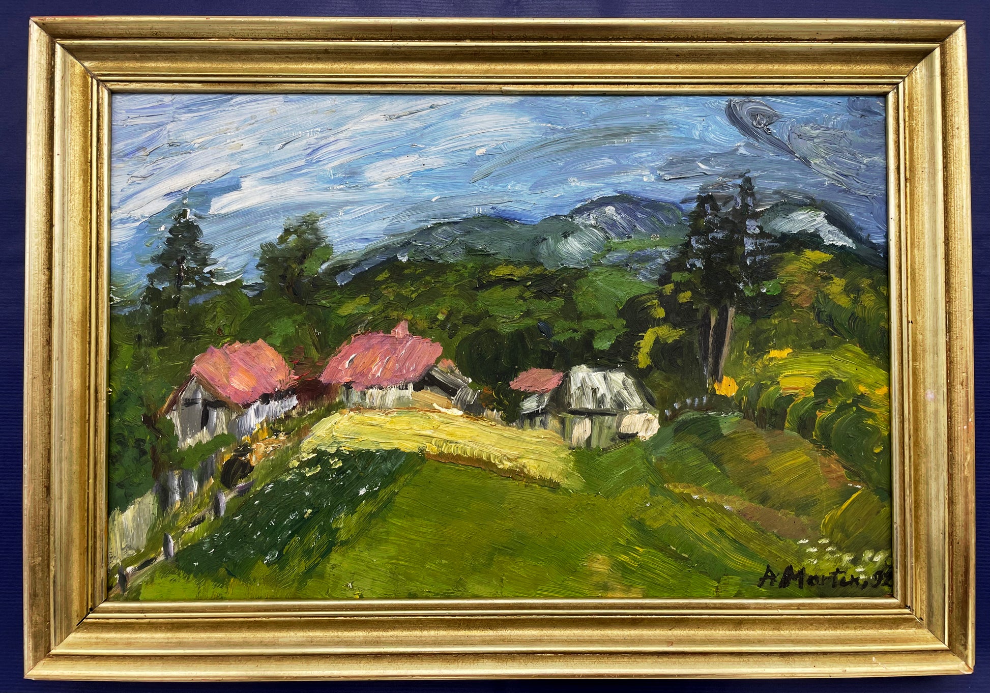 Vintage oil painting of a Carpathian village landscape in a gilt frame, signed Martin 1992