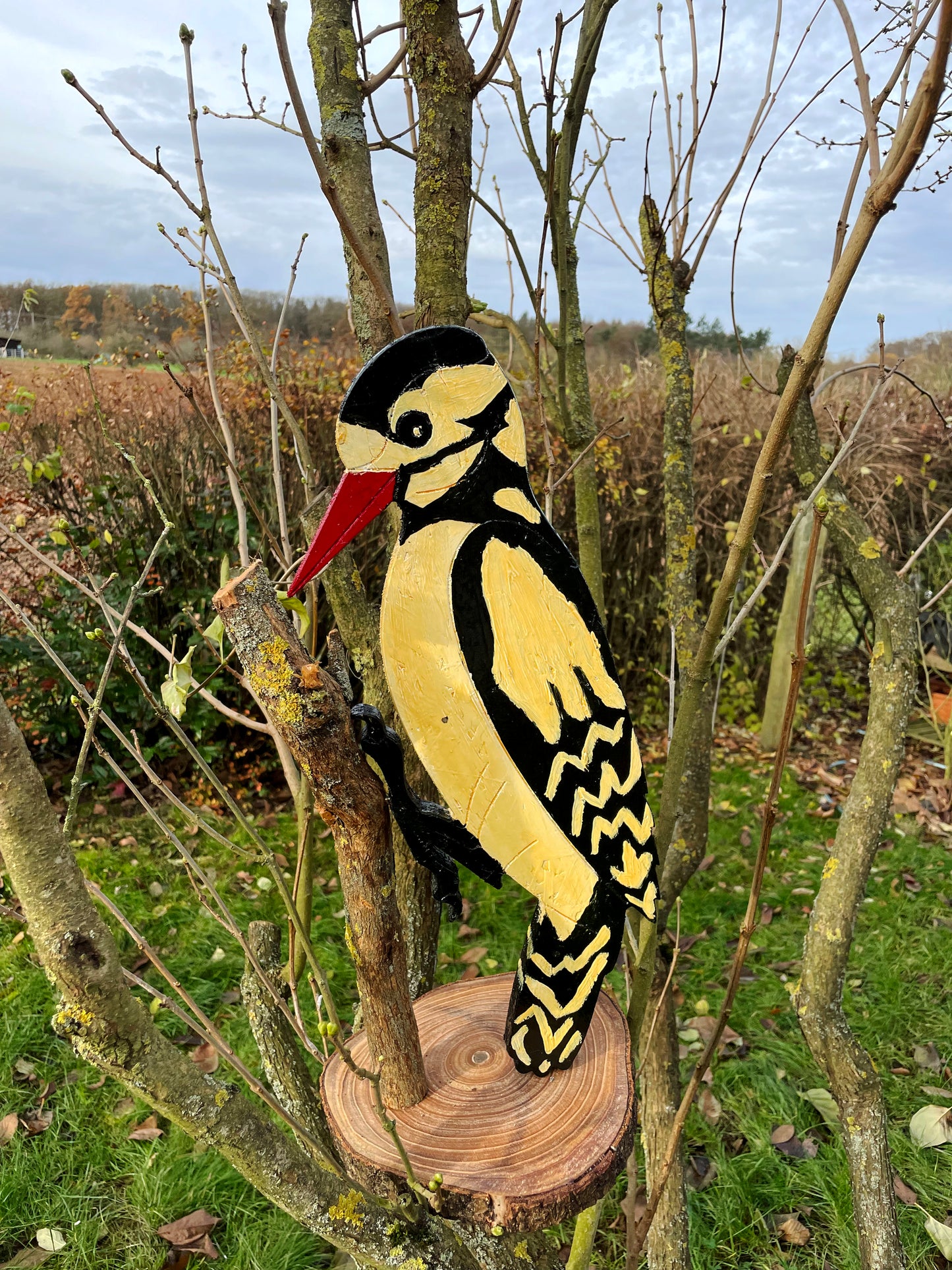 Carved woodpecker head and red beak detail, hand-painted vintage Volk-Art