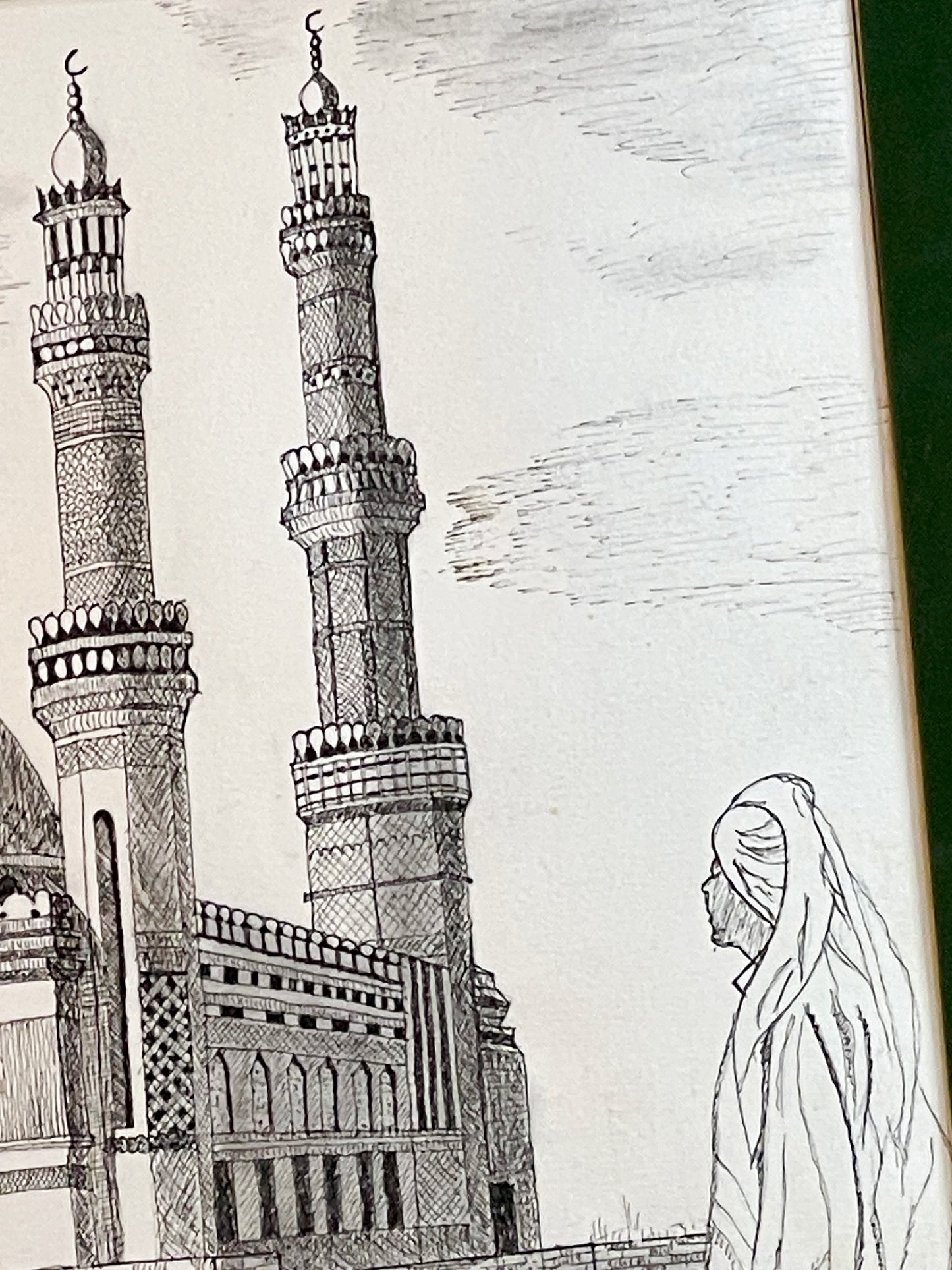 Close detail of fine pen and ink linework on two mosque minarets and a robed figure