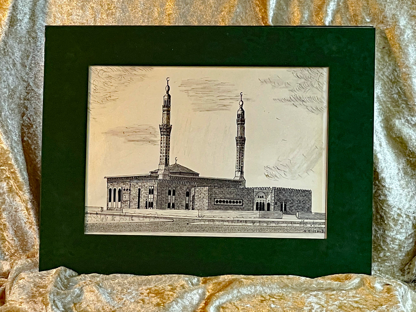 Hand-drawn Turkish mosque with twin minarets in dark green velvet passepartout, ivory paper