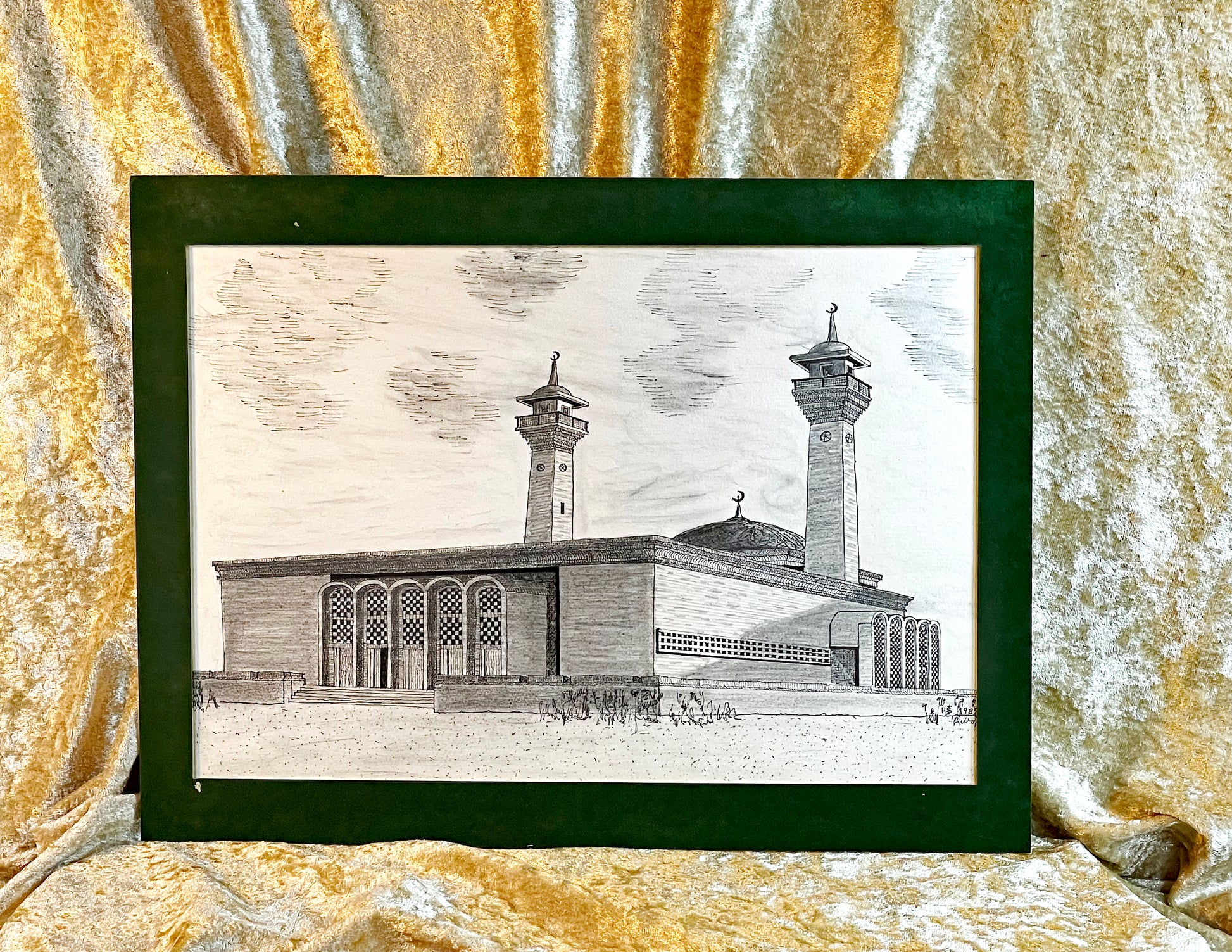 Ink drawing of a domed Turkish mosque at dusk in dark green velvet mount