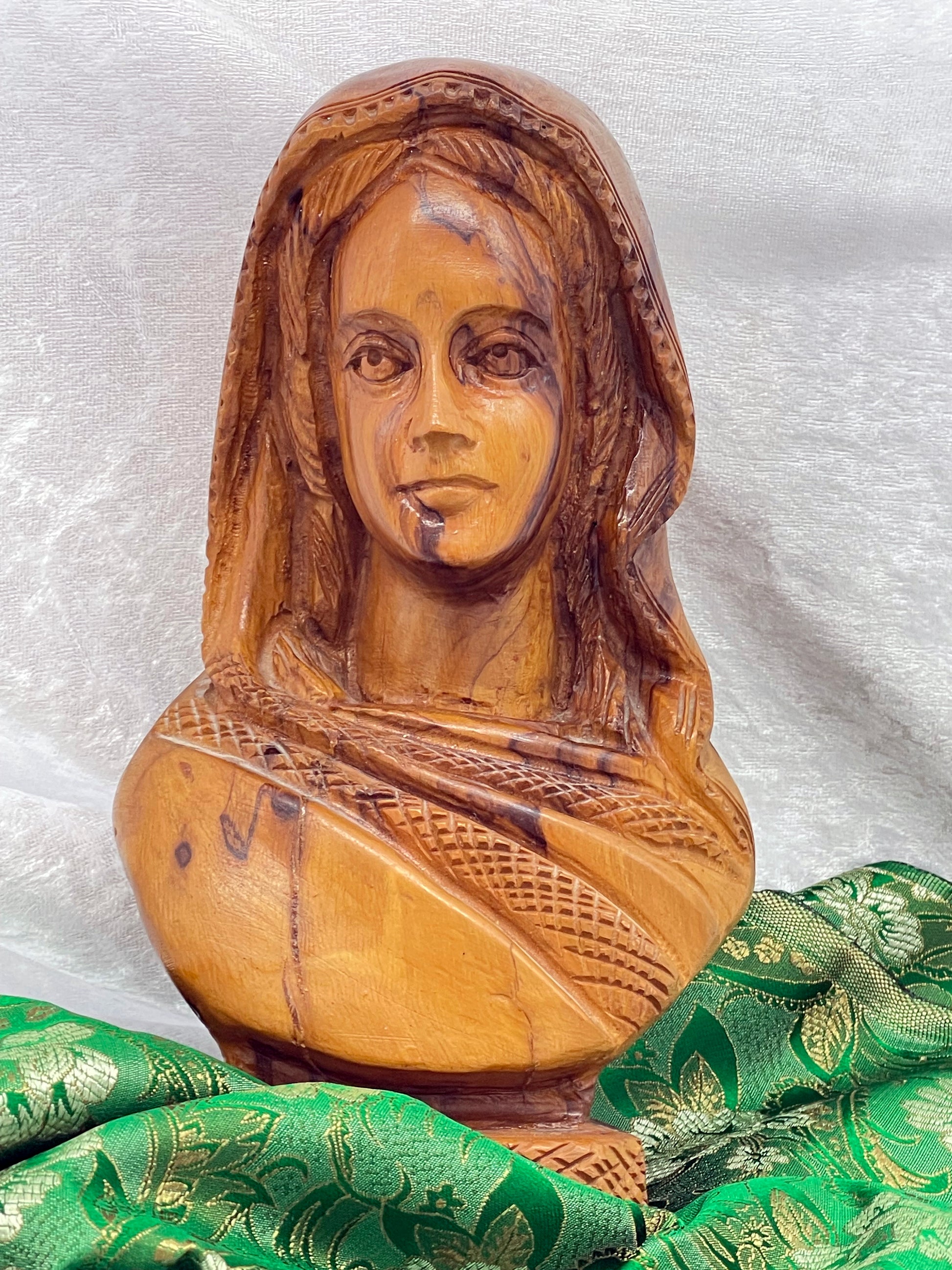 Hand-carved Indian woman bust in exotic olive wood, draped sari with bindi, front view