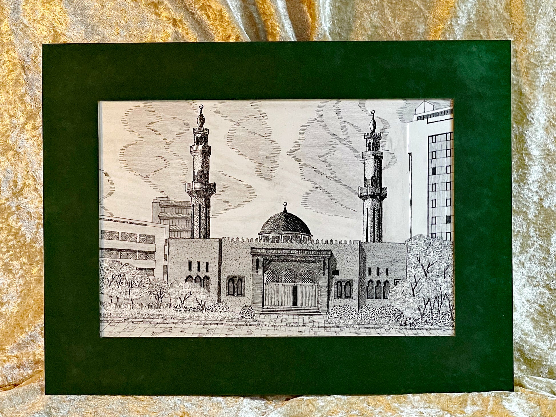 Hand-drawn Turkish mosque with garden and twin minarets in dark green velvet passepartout