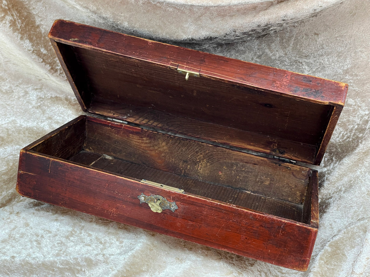 Open antique French toilette box showing wooden interior compartment
