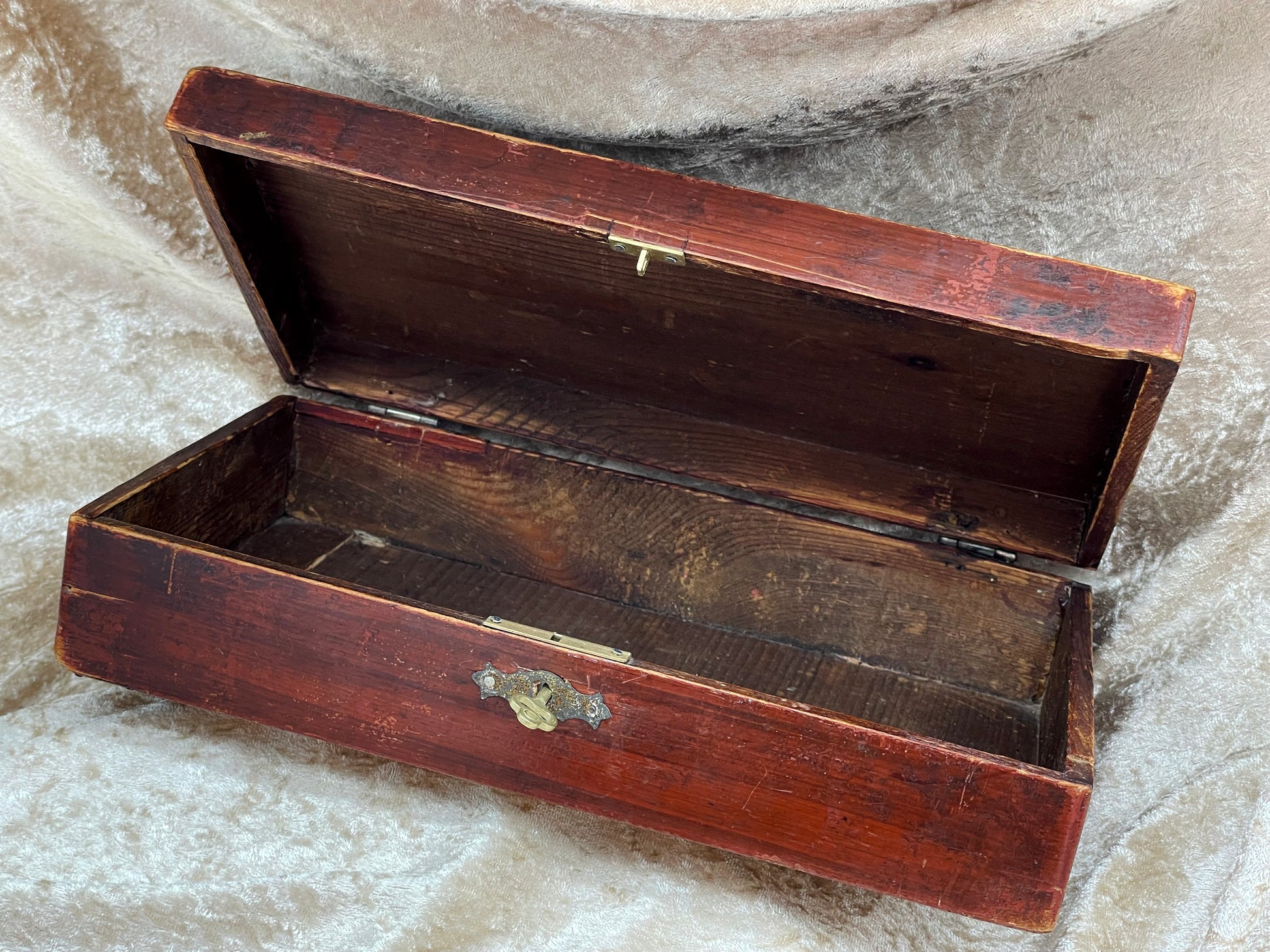 Open antique French toilette box showing wooden interior compartment