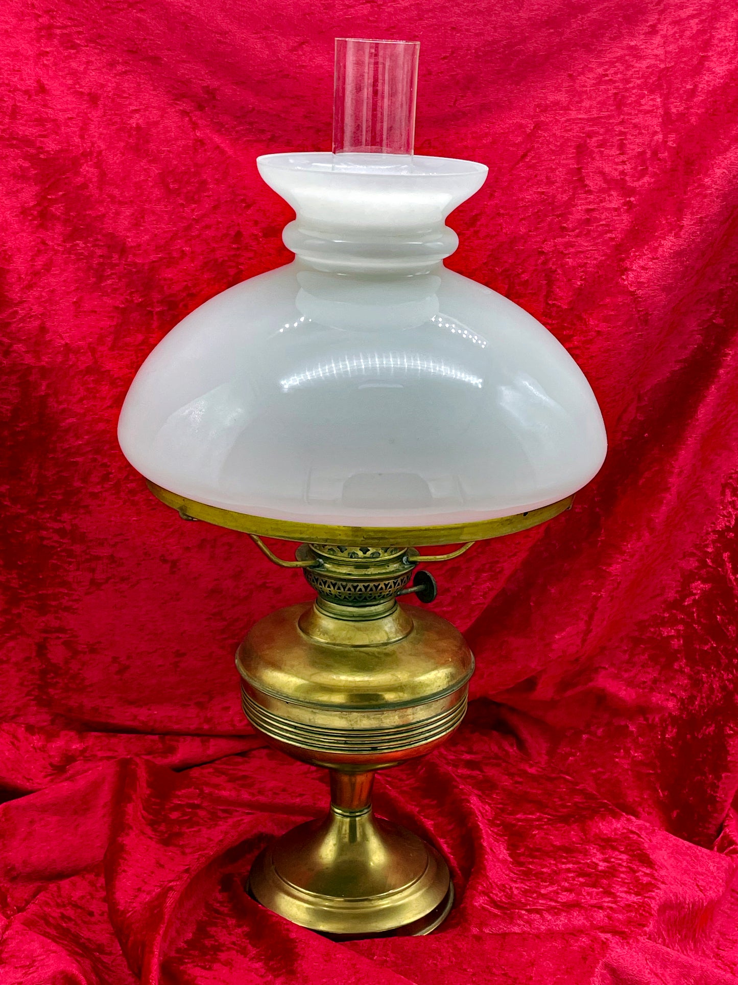 Full view of antique brass petroleum lamp with opaline milk-glass shade