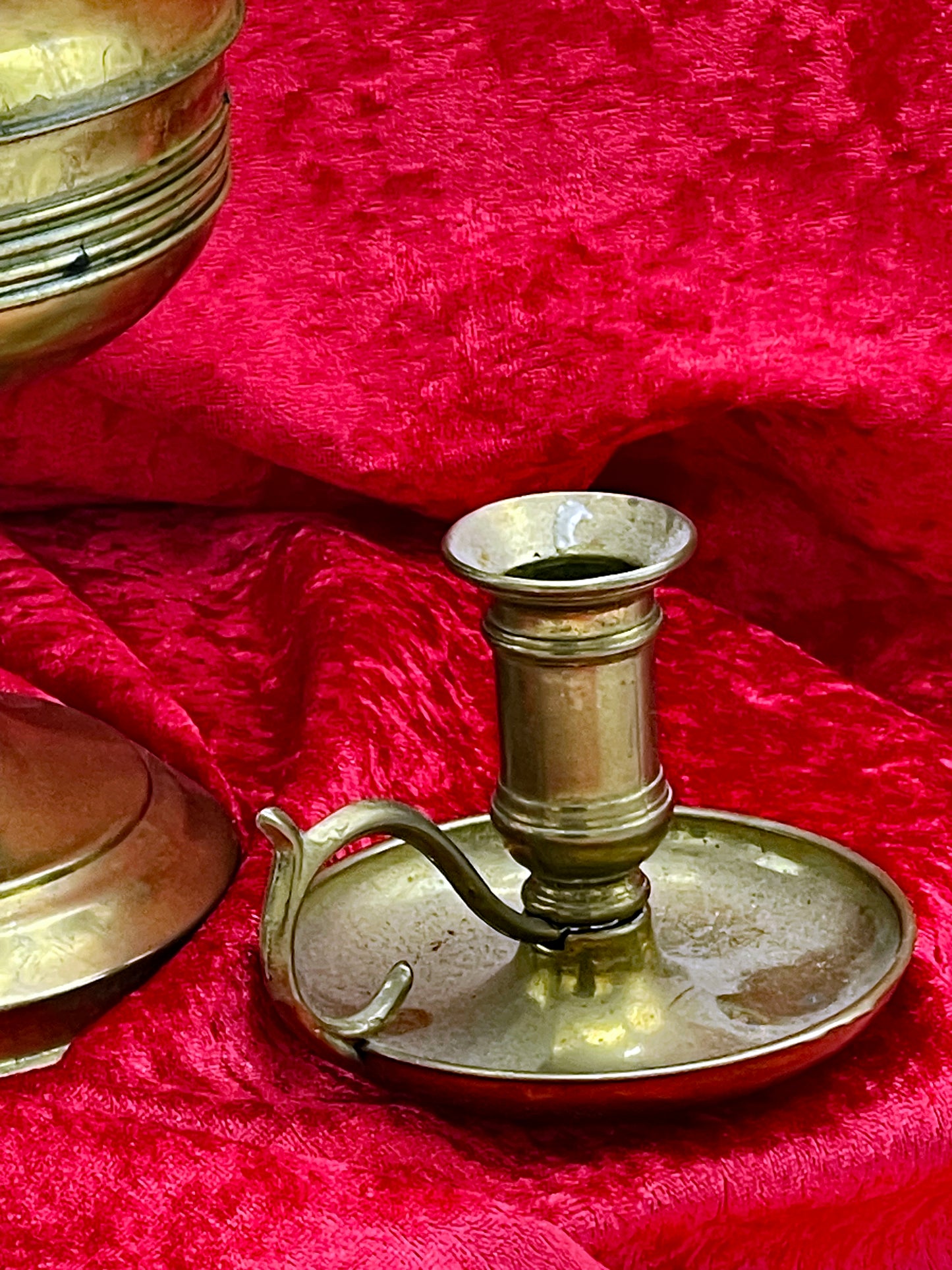 Vintage brass chamberstick candle holder with finger-loop handle and drip pan