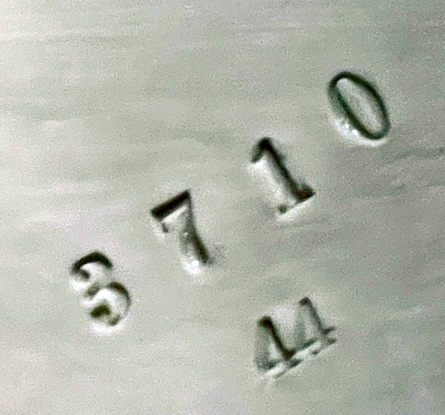 Impressed model number 3710 on the base of the porcelain lion