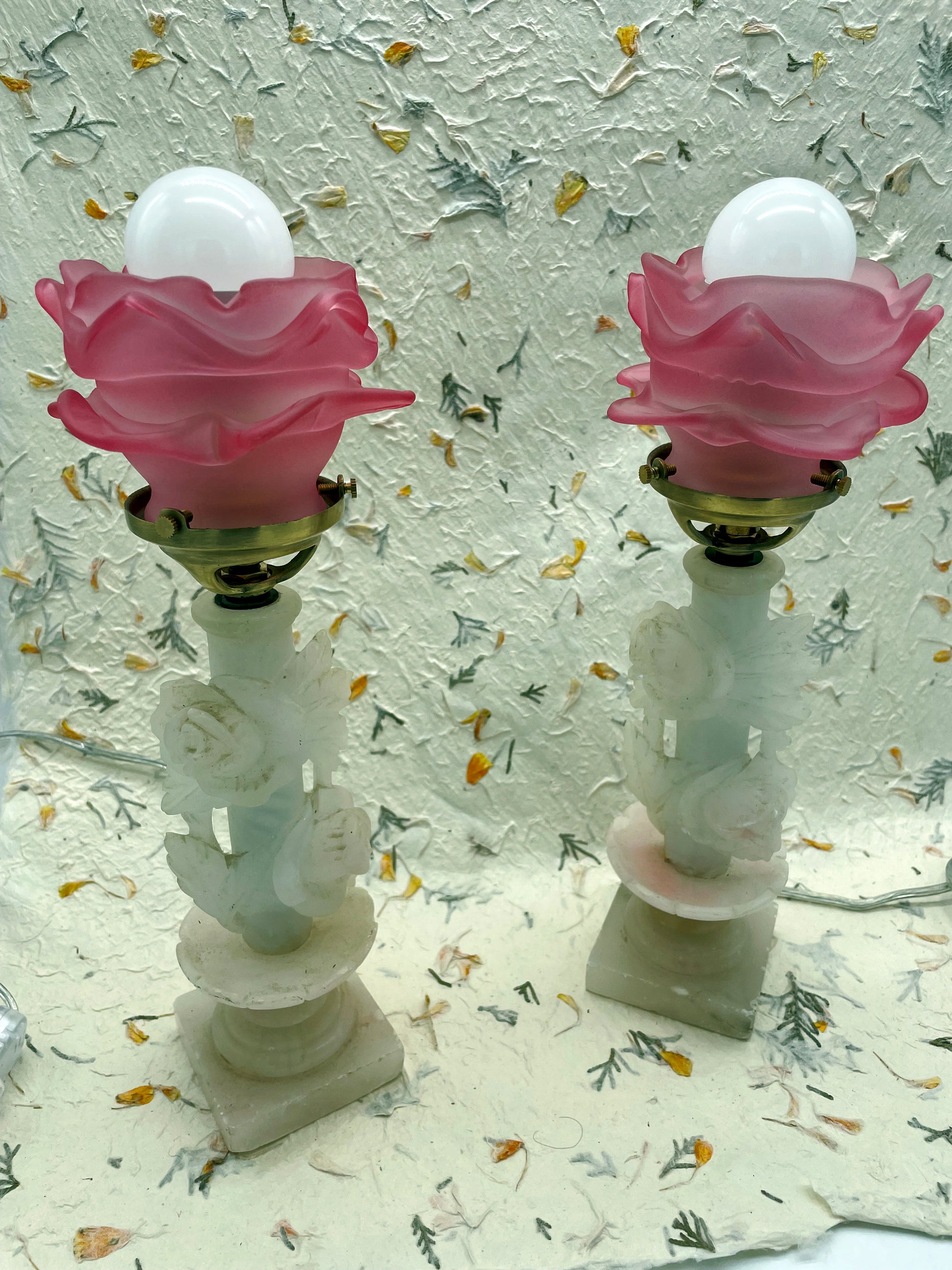 White marble lamp with carved roses and pink rose glass shade