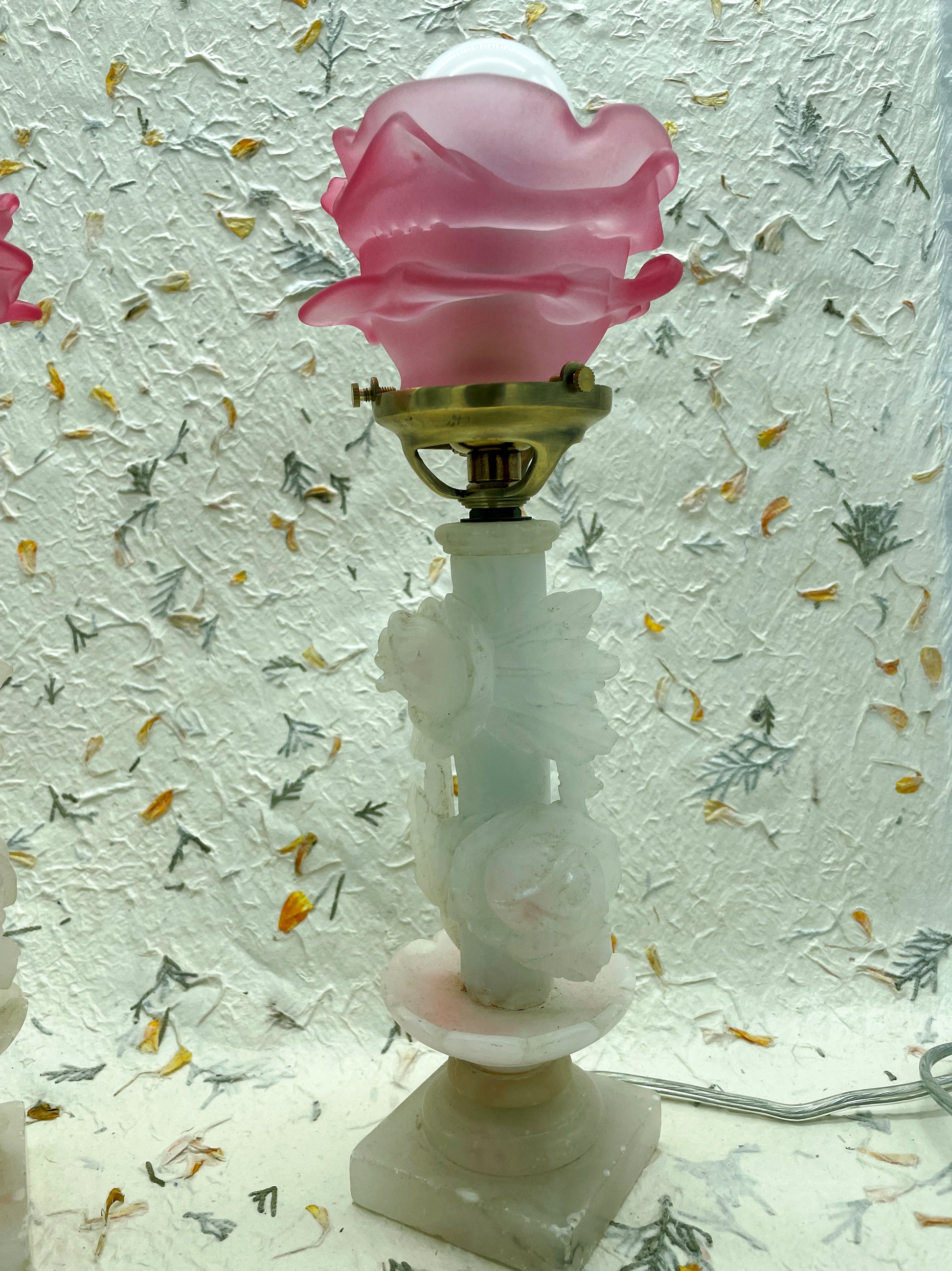 Detail of pink pâte de verre rose shaped lamp shade