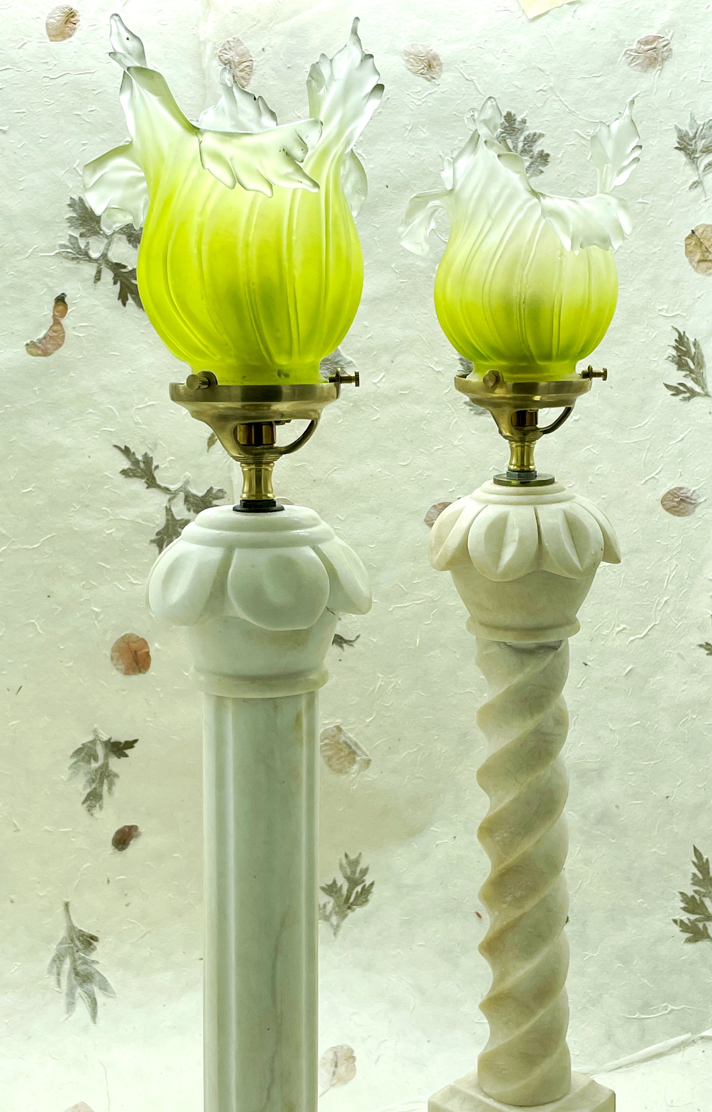 Pair of French white marble column lamps with green pate de verre flower shades