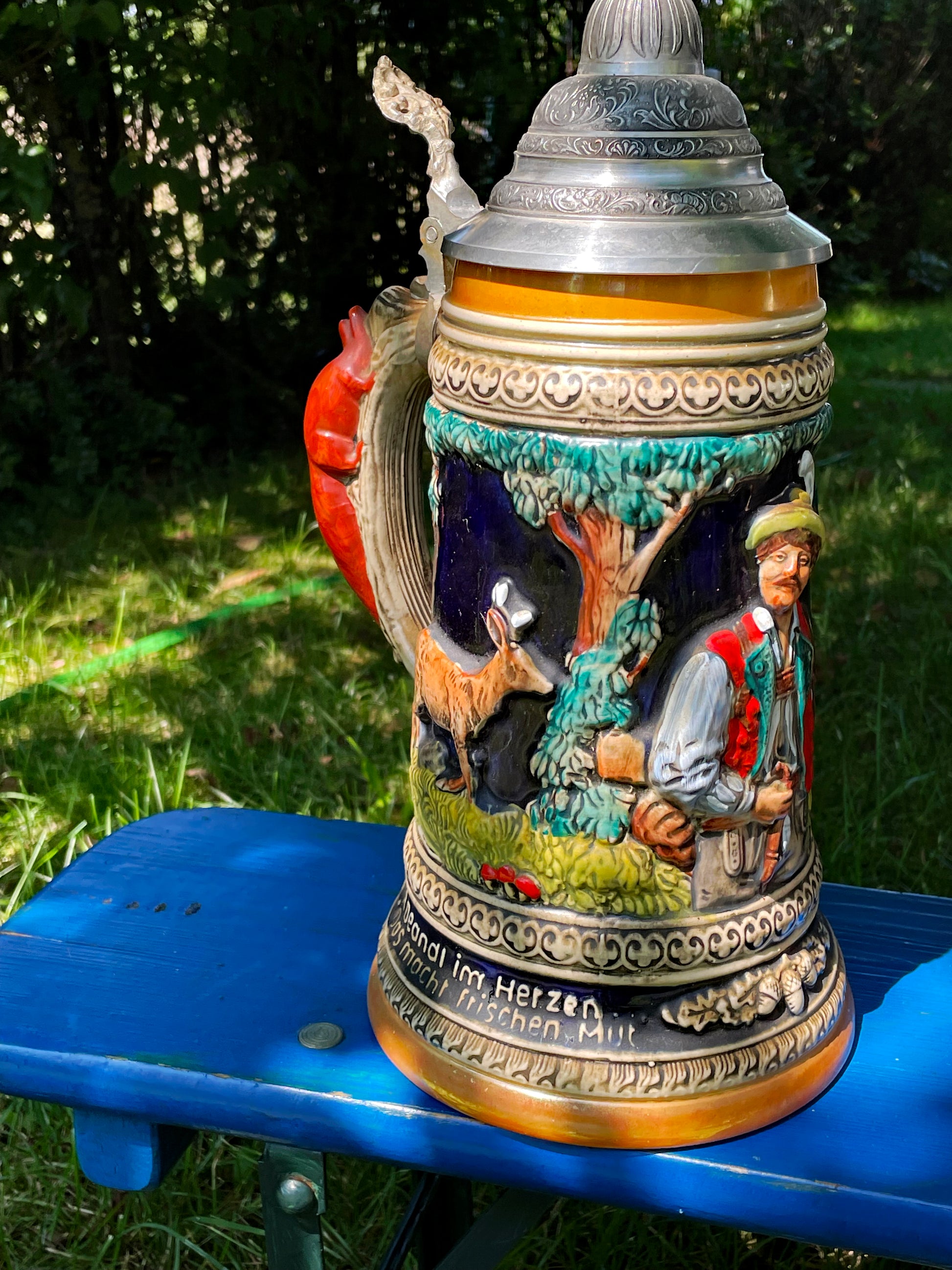 Largest German stein, raised relief hunting scene with hunter and deer