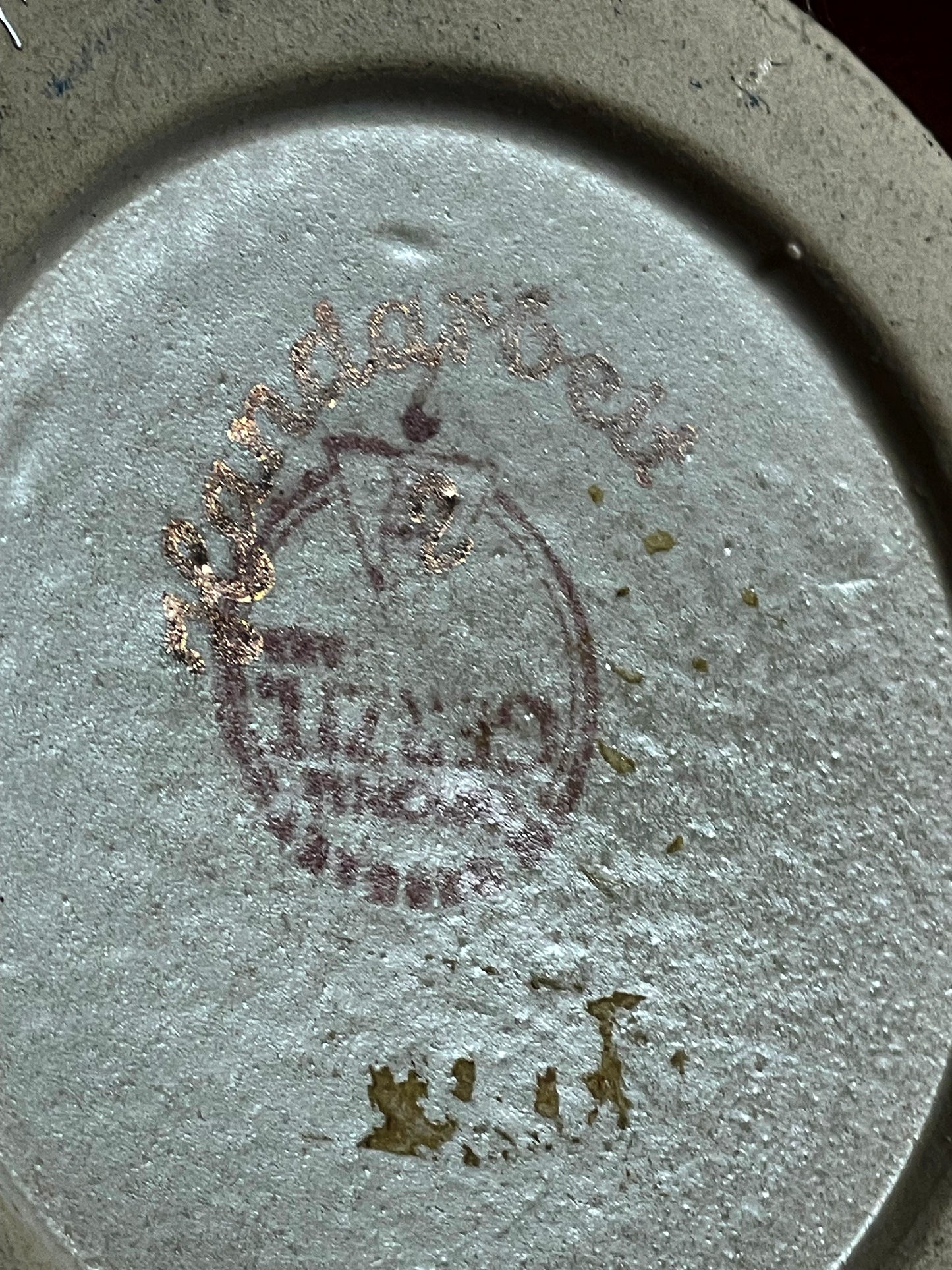 Maker stamp impressed on the base of a German relief beer stein