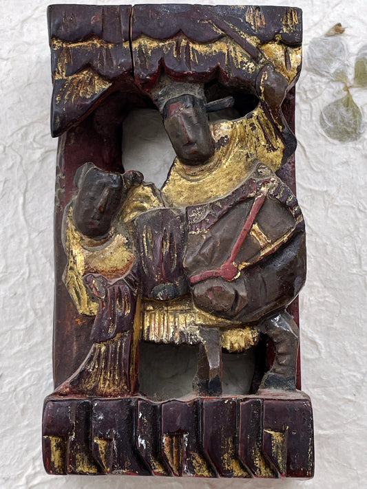 Antique Chinese carved wood collectible with gilded figures and original red paint