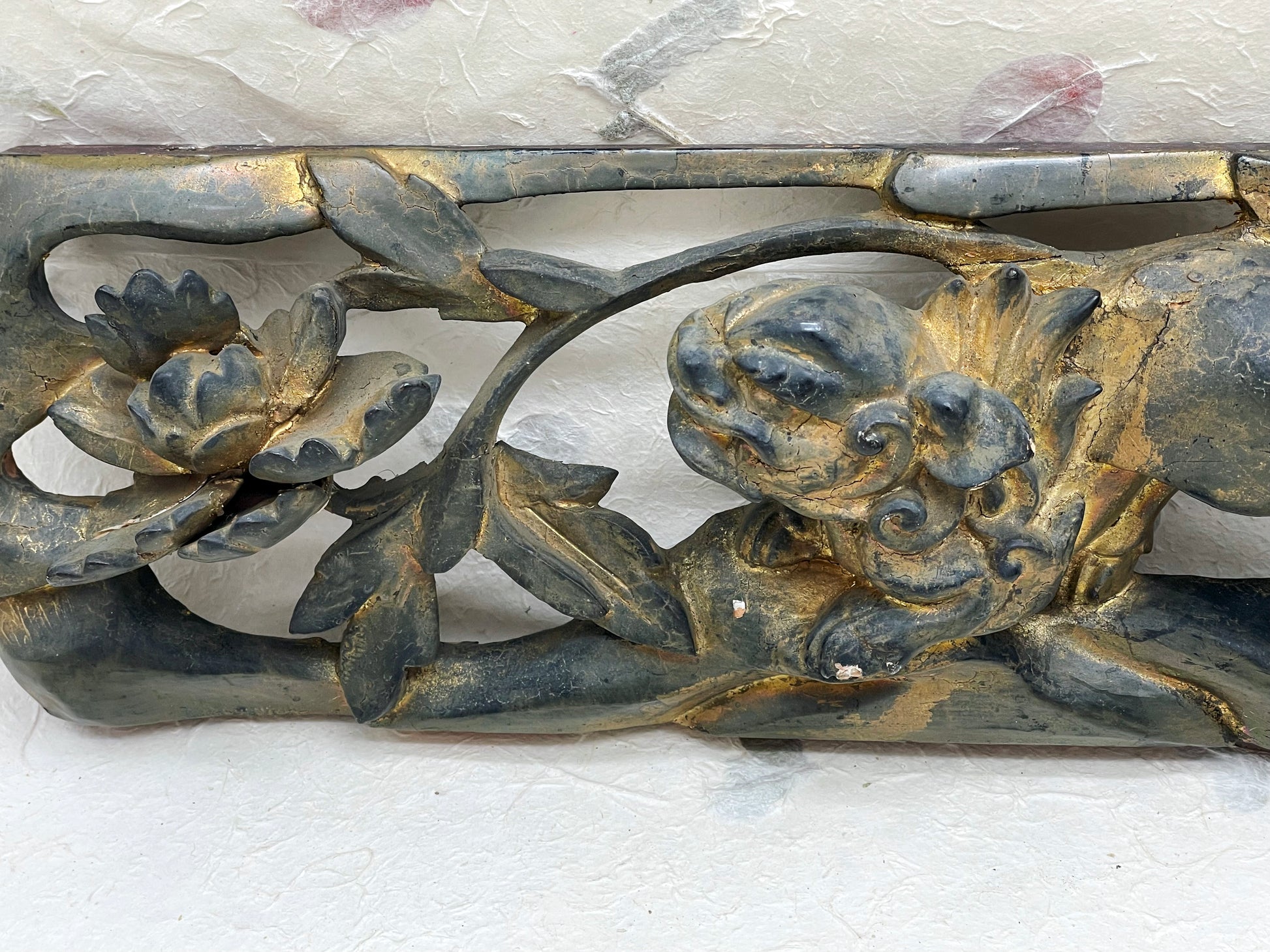 Side profile showing depth of relief carving on Chinese panel