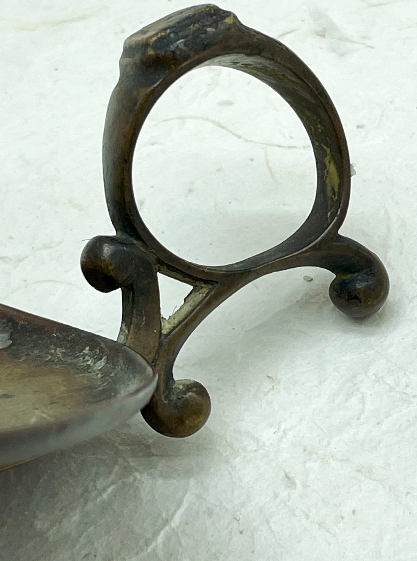 Finger grip handle close up brass