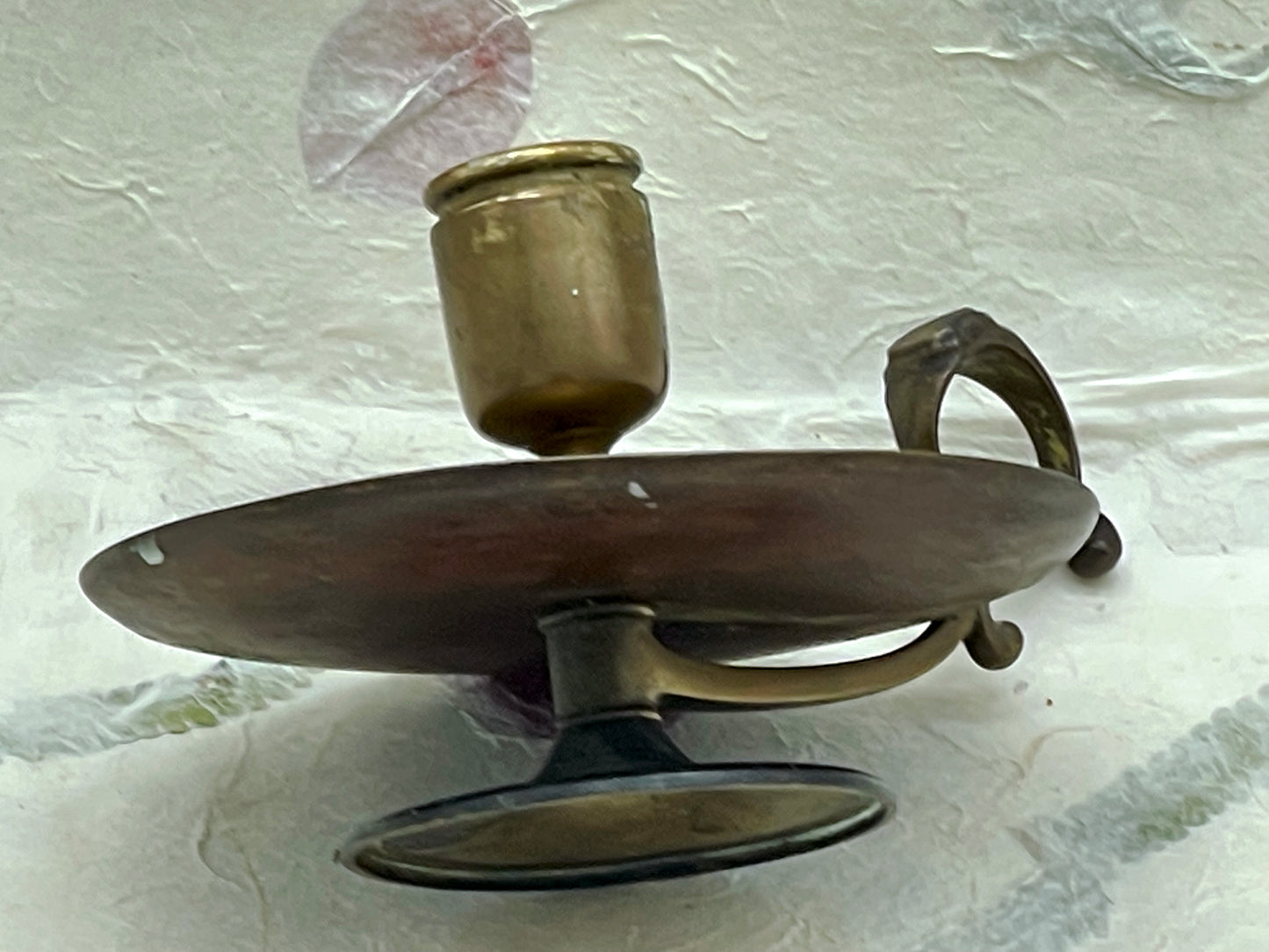 Antique brass and copper chamberstick candle holder with finger grip