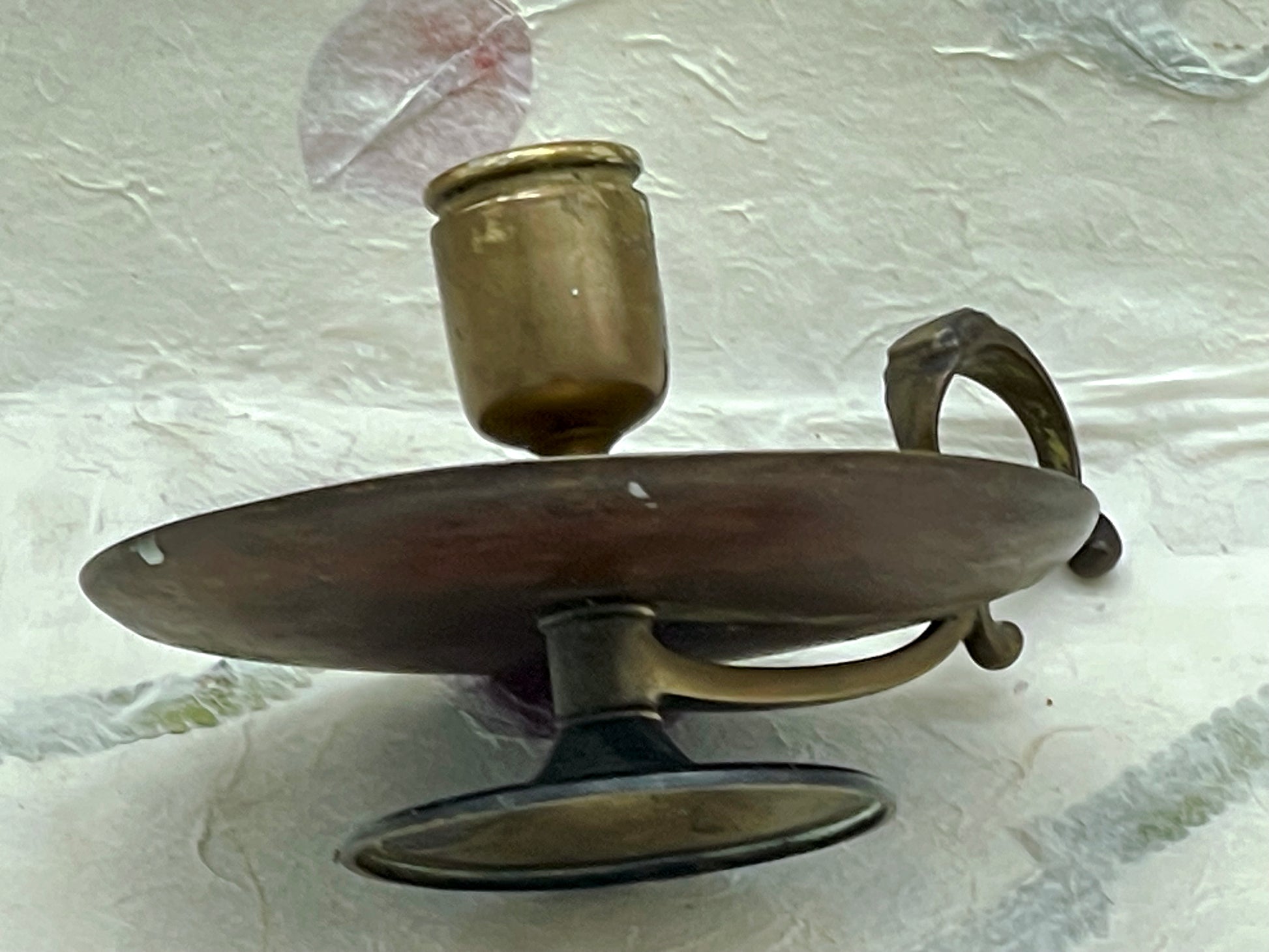 Antique brass and copper chamberstick candle holder with finger grip