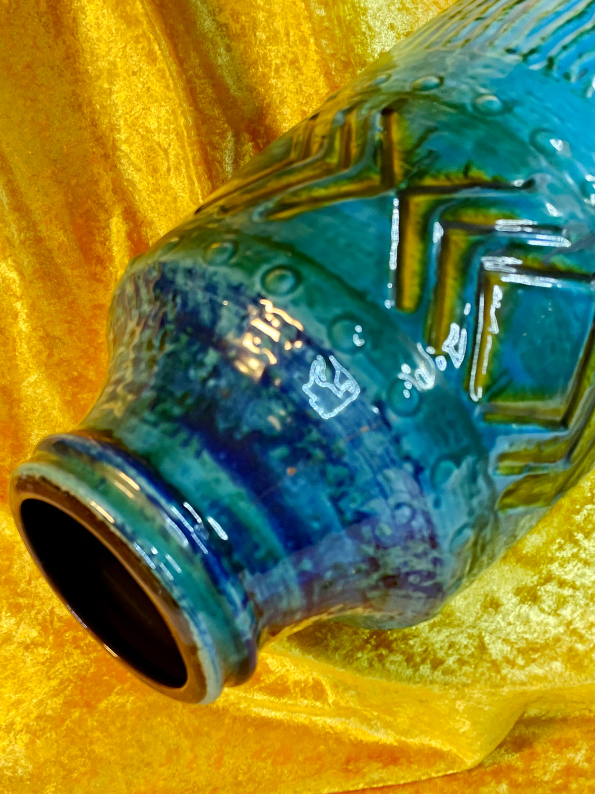 Detail of neck and rim with deep blue glaze