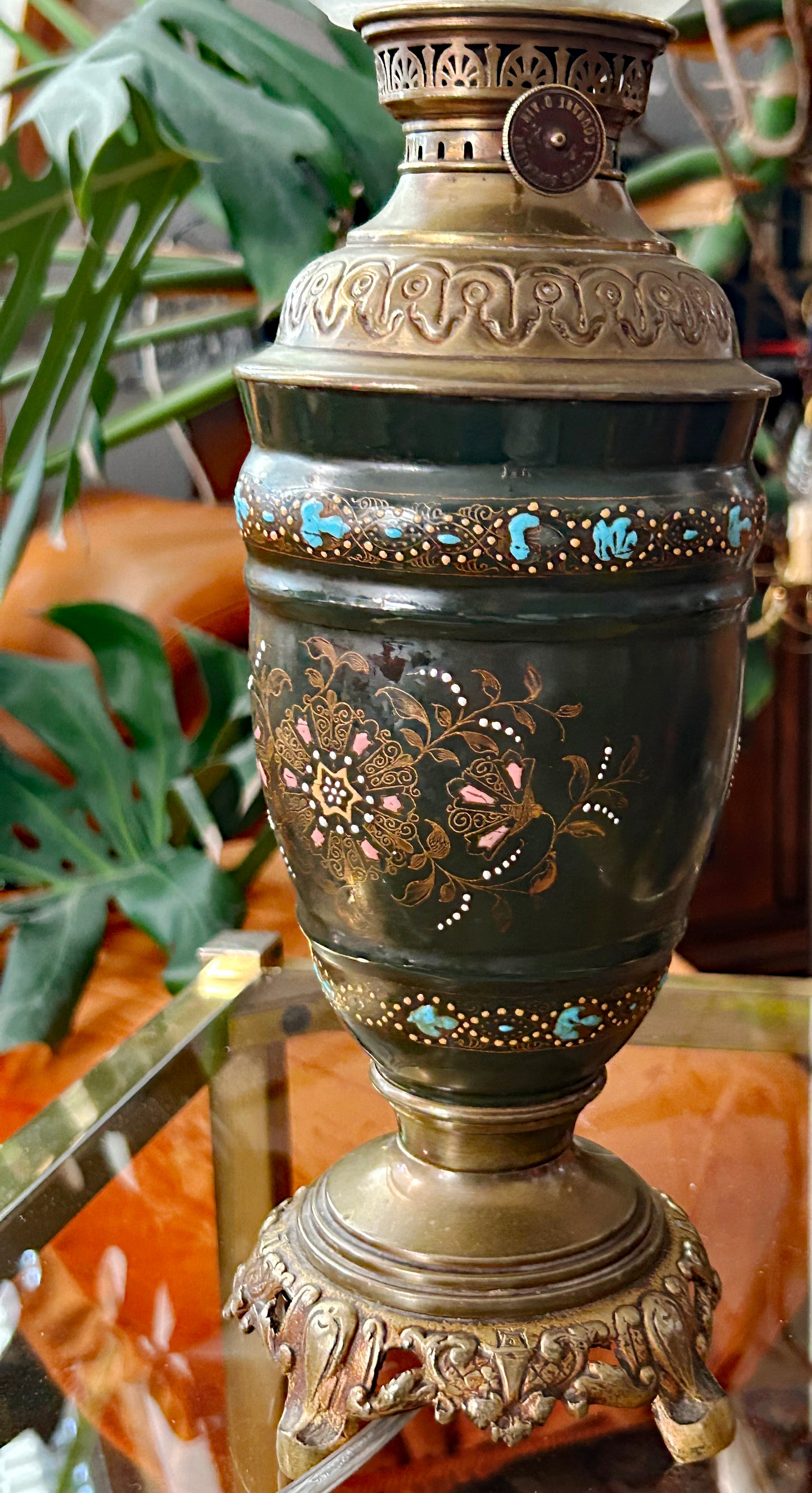 Detail of cloisonné enamel lamp body, hand painted floral panels in pink gold and turquoise