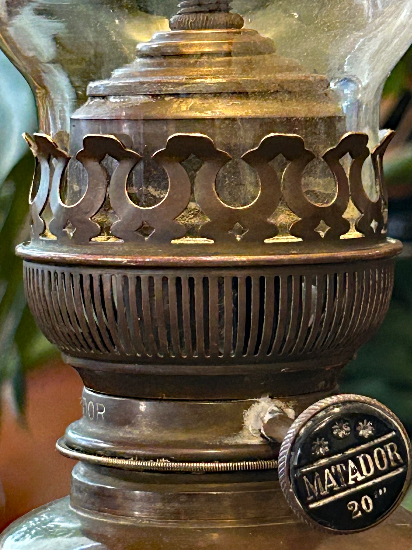 Brass MATADOR 20 burner badge and openwork gallery detail