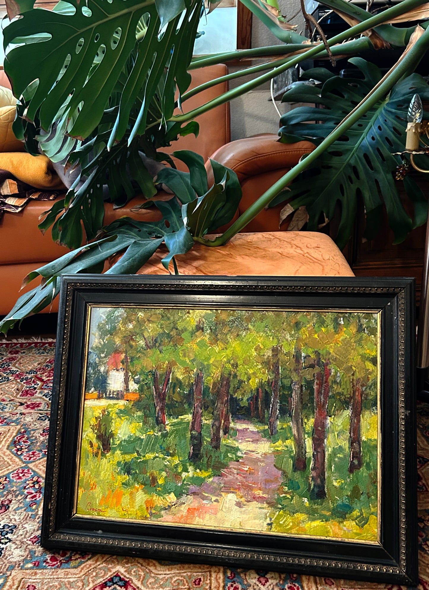 Ștefan Boca forest path oil painting shown framed and leaning, scale and context view