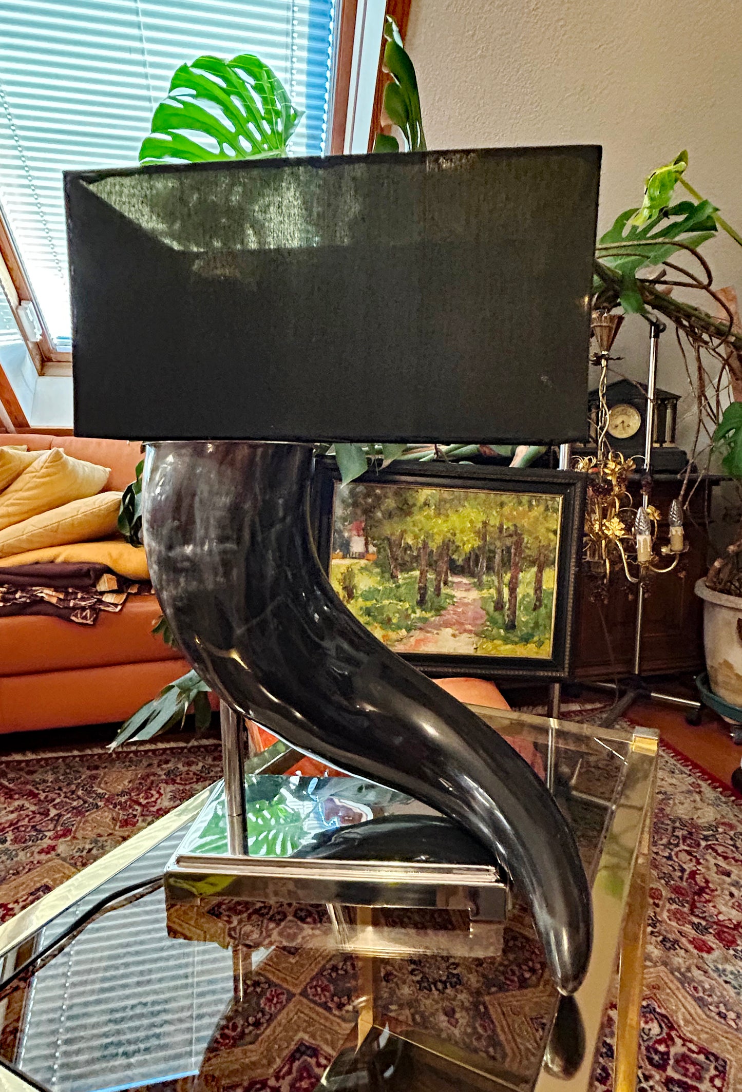 Italian horn designer table lamp in natural polished horn with nickel base and black shade, straight-on view