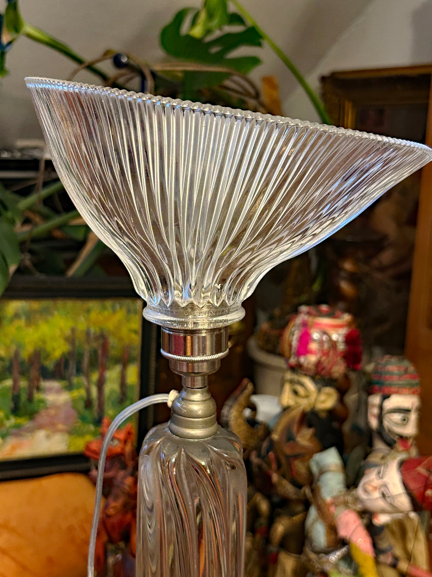 Close-up of the asymmetric Holophane prismatic glass shade showing fine fanned optical ribs