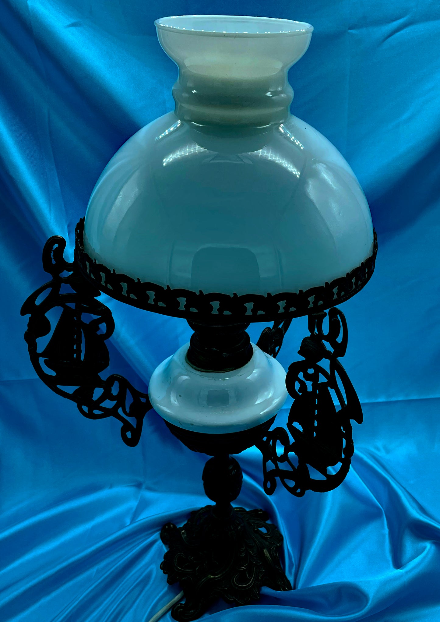 Cream opaline glass shade of the antique petroleum lamp
