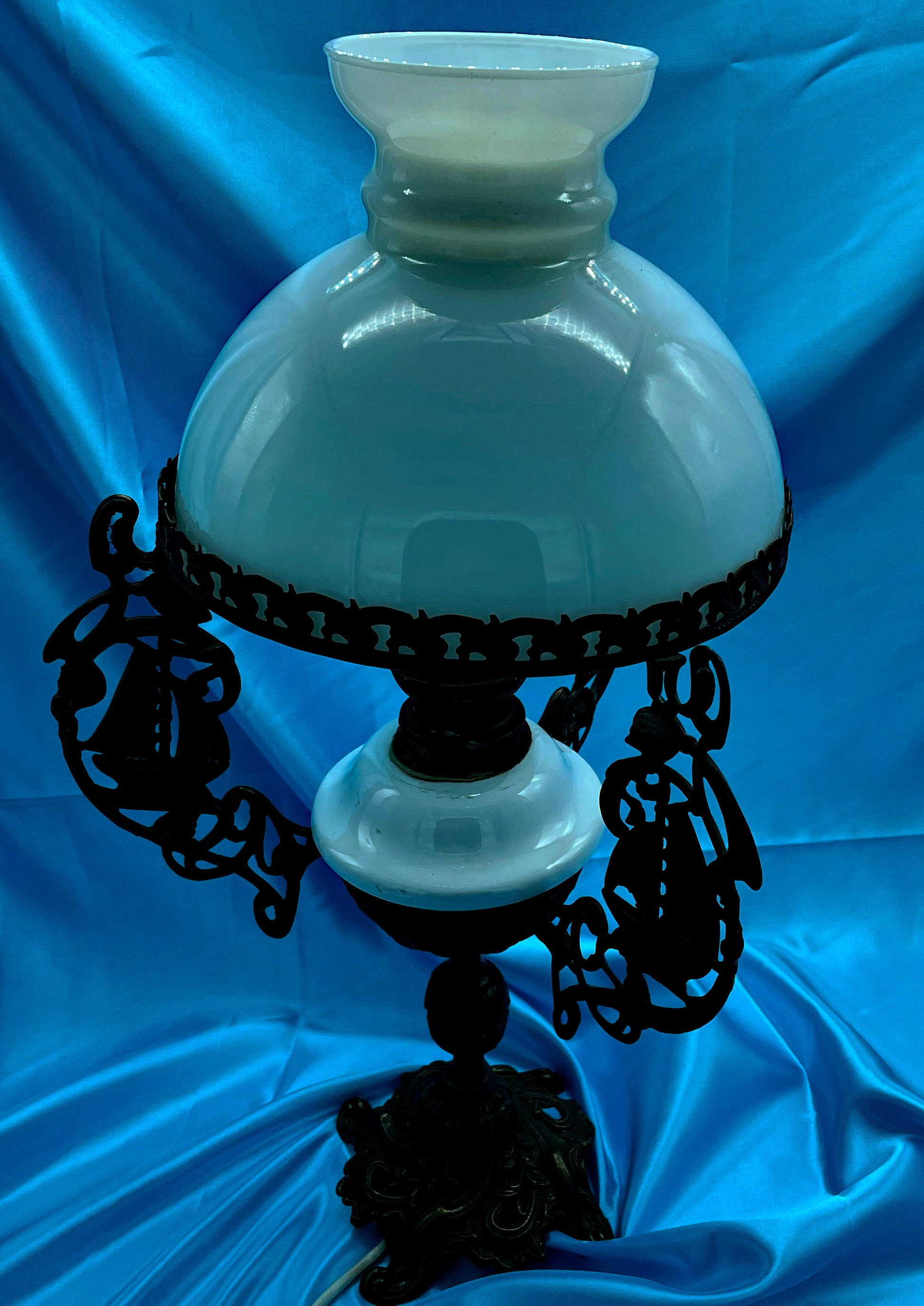Cream opaline glass shade of the antique petroleum lamp